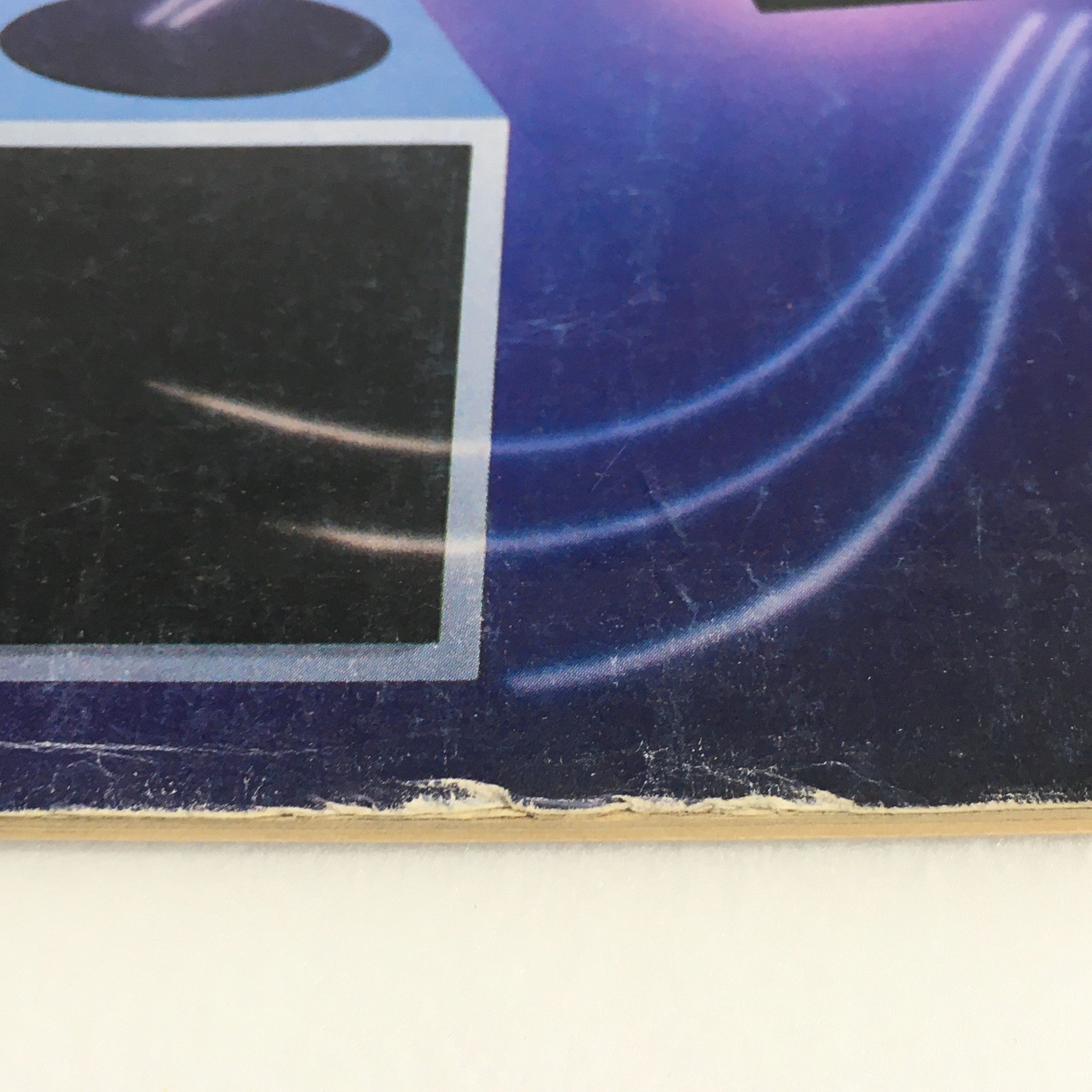 Close-up detail of the edge of the VTG Stereo Review Music Magazine April 1985, showing minor wear and age.