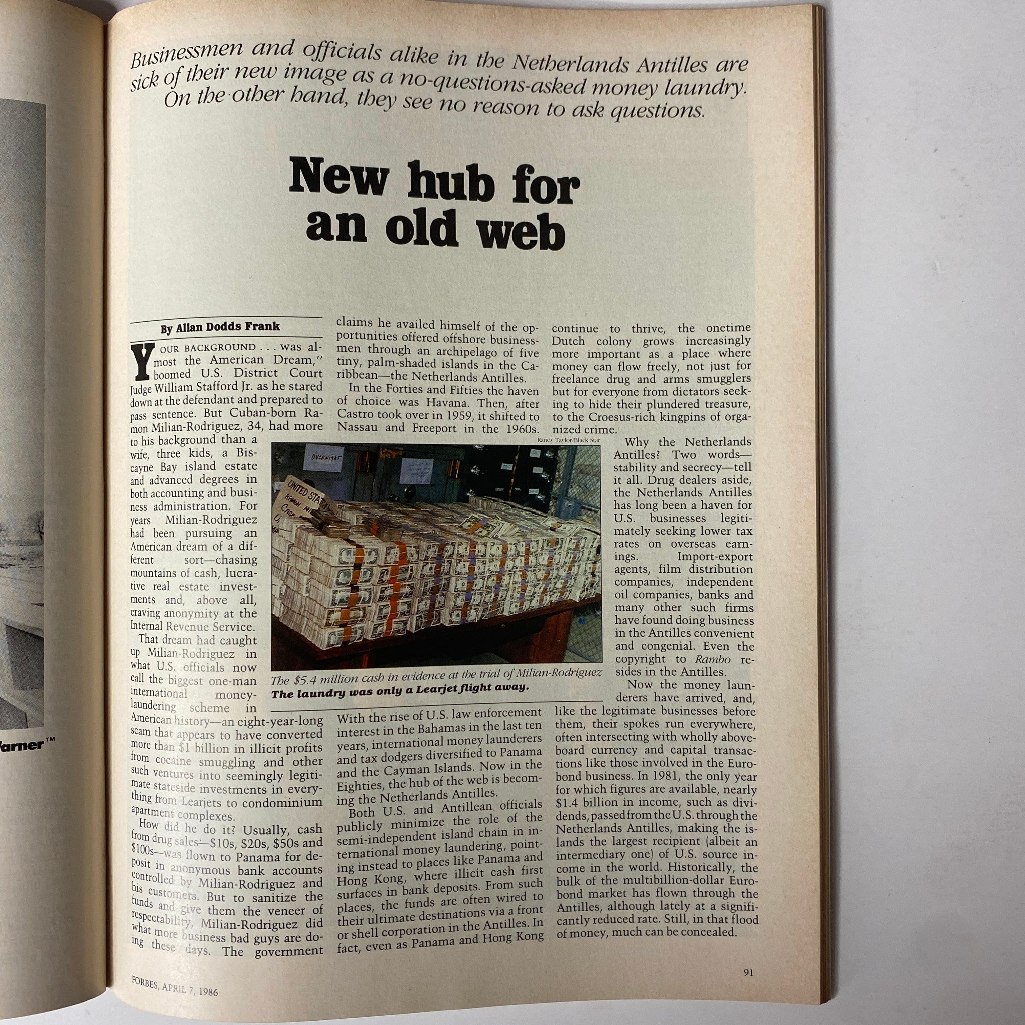 Forbes Magazine April 7, 1986 article titled 'New hub for an old web', featuring stacks of cash and discussing the financial situation in the Netherlands Antilles.