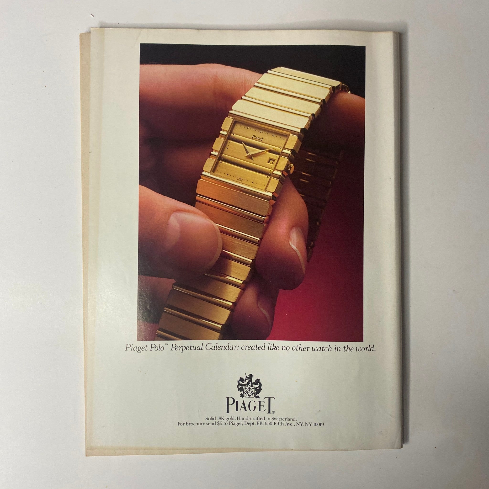 Back cover of Forbes Magazine August 11, 1986, showcasing an advertisement for the Piaget Polo Perpetual Calendar watch, emphasizing luxury and craftsmanship.