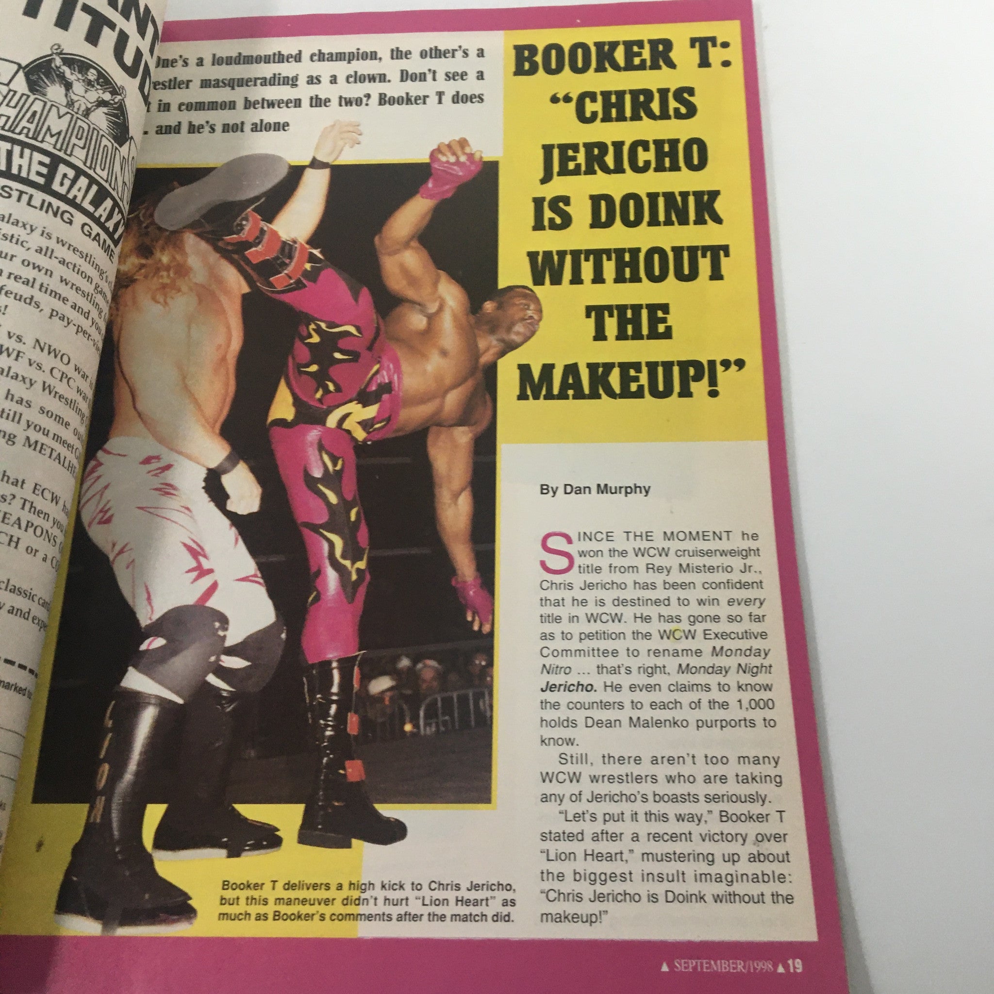 Pro Wrestling Illustrated September 1998 Chyna, Bill Goldberg, Shawn Michaels VG - An action shot featuring Booker T delivering a kick to Chris Jericho during a wrestling match.