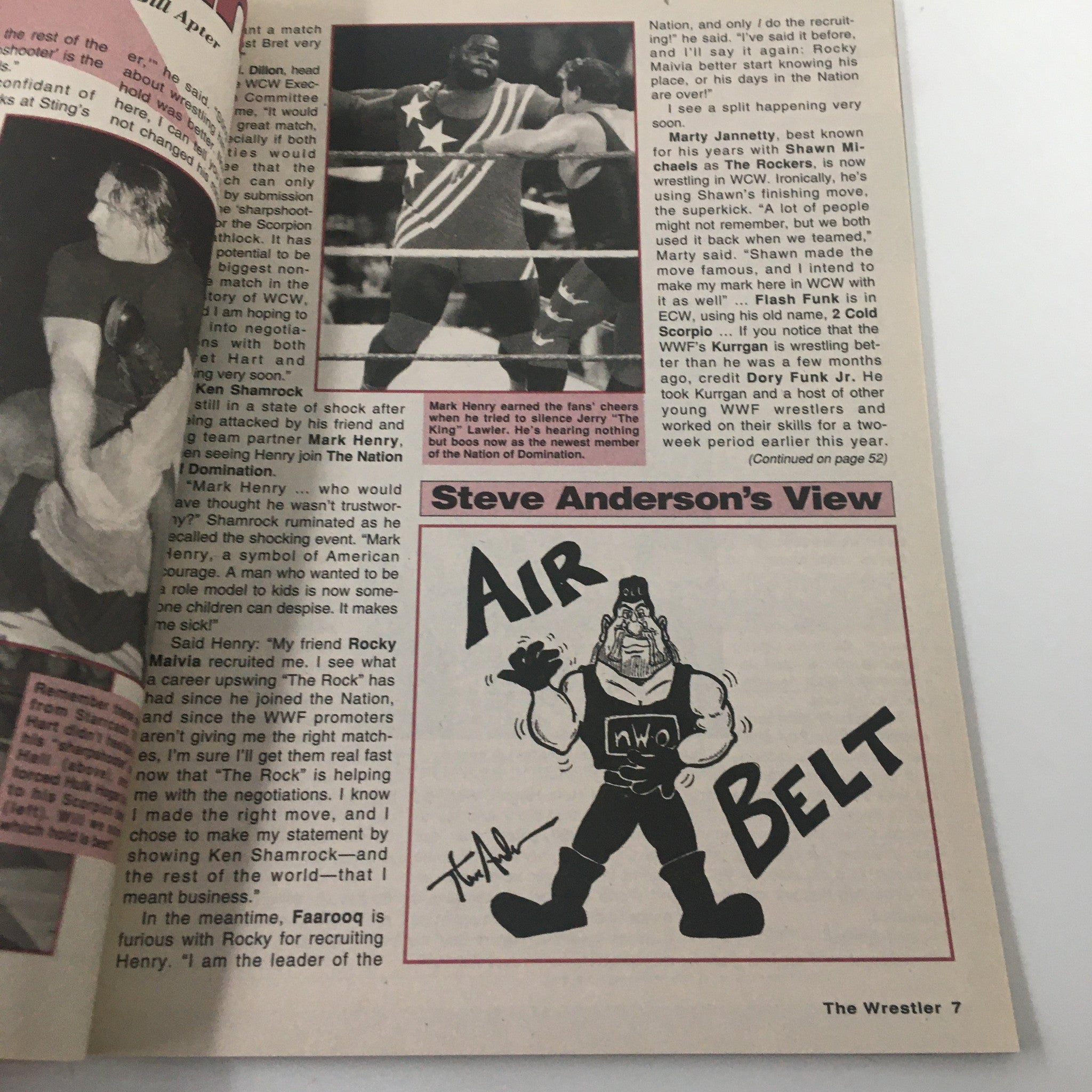 An interior page of The Wrestler Magazine May 1998 featuring a photo of Mark Henry during a wrestling match and an editorial by Steve Anderson.