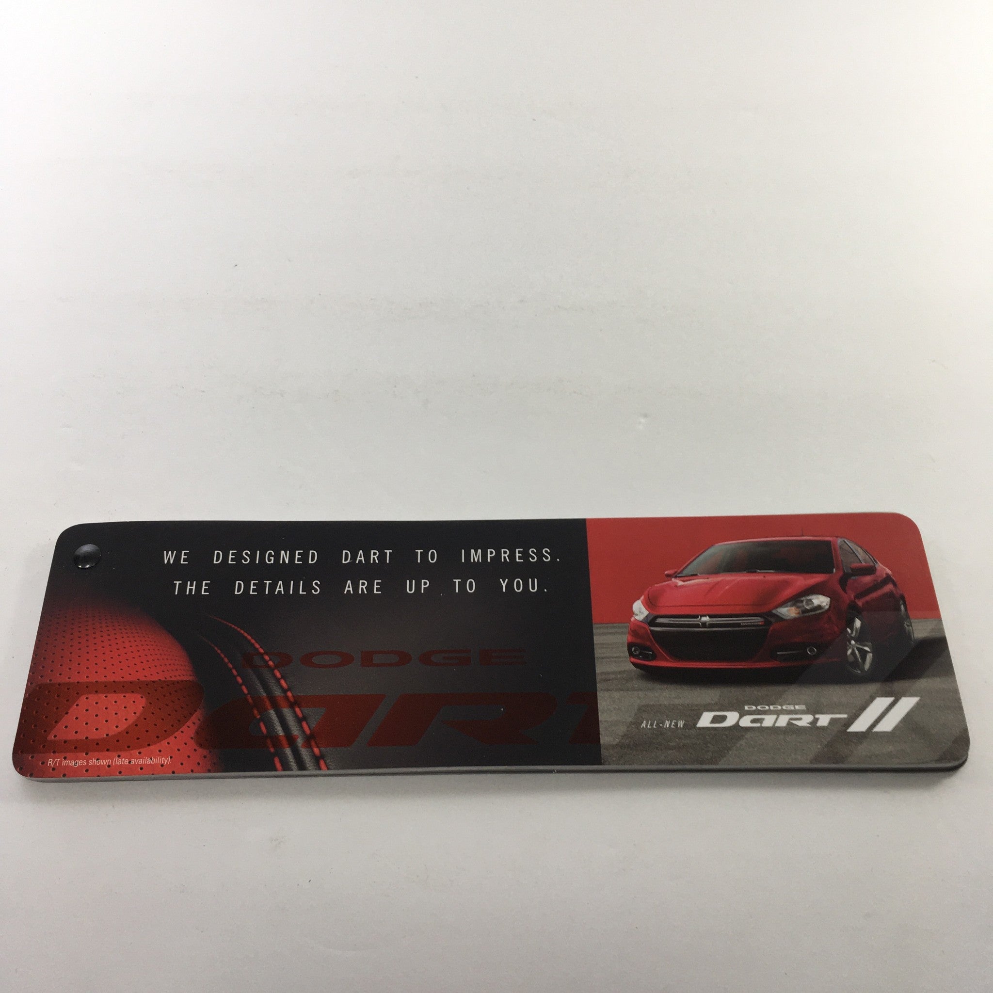 2012 Dodge Dart II Dealership Car Auto Brochure Catalog featuring a sleek red Dodge Dart with promotional details, designed to impress customers with its modern design.