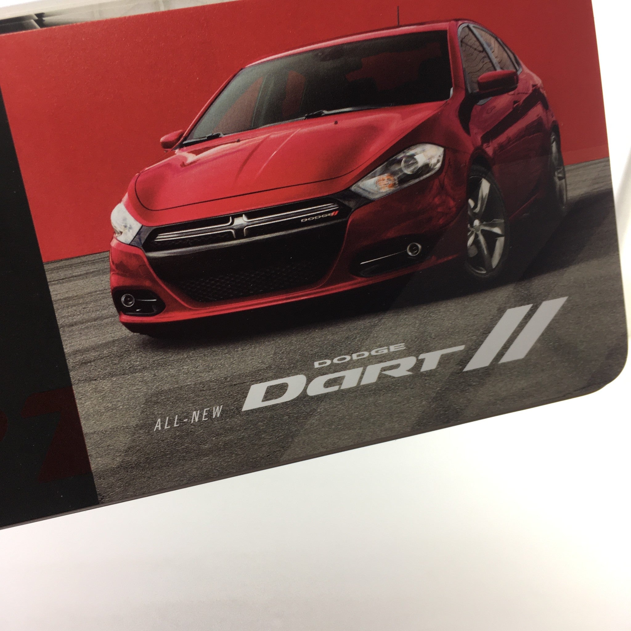 2012 Dodge Dart II Dealership Car Auto Brochure Catalog featuring a sleek red Dodge Dart parked on a modern backdrop.