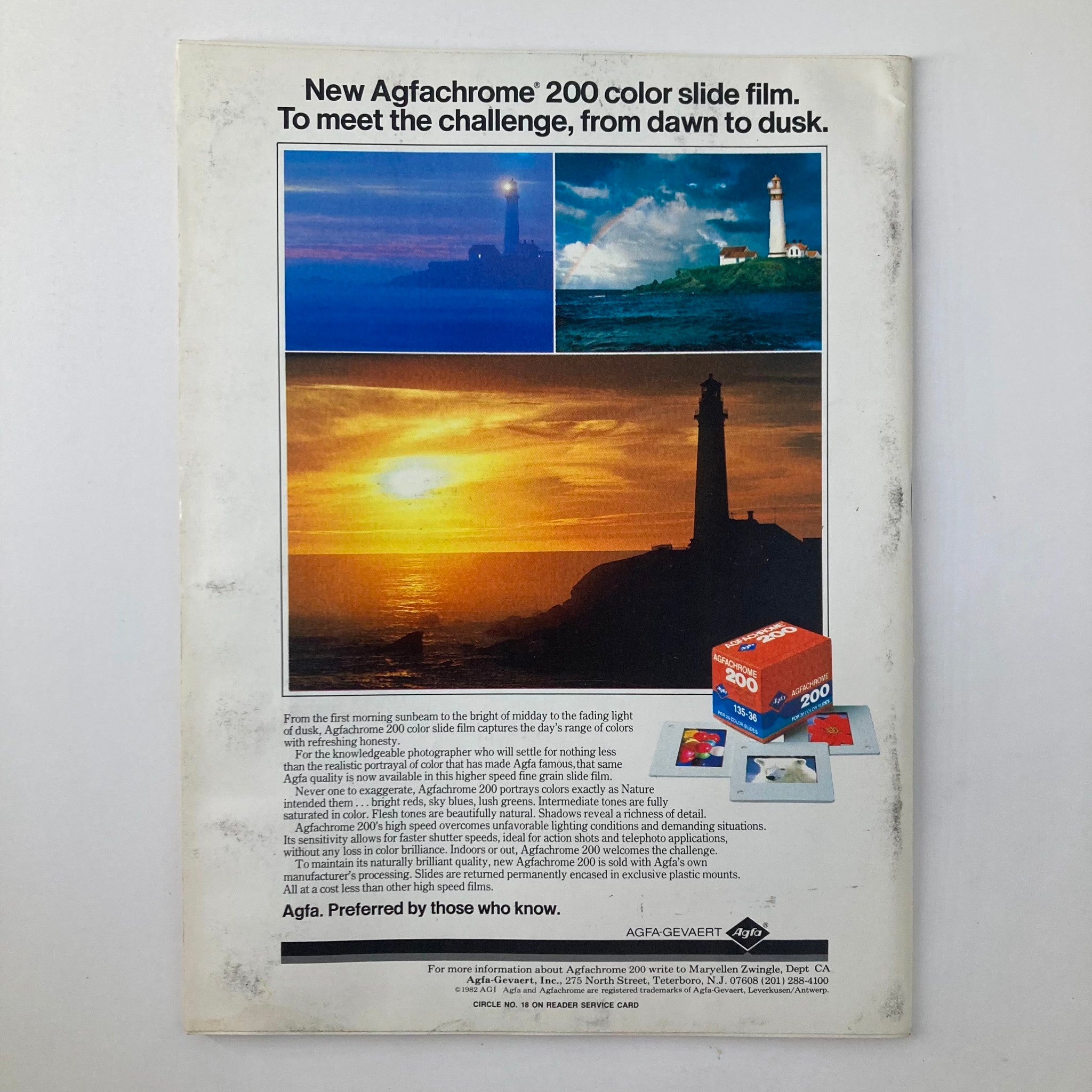 Back cover of Camera Arts Magazine, February 1983, featuring an advertisement for Agfachrome 200 color slide film. The ad highlights the film's capabilities, illustrated with stunning photography of lighthouses and sunset scenes.