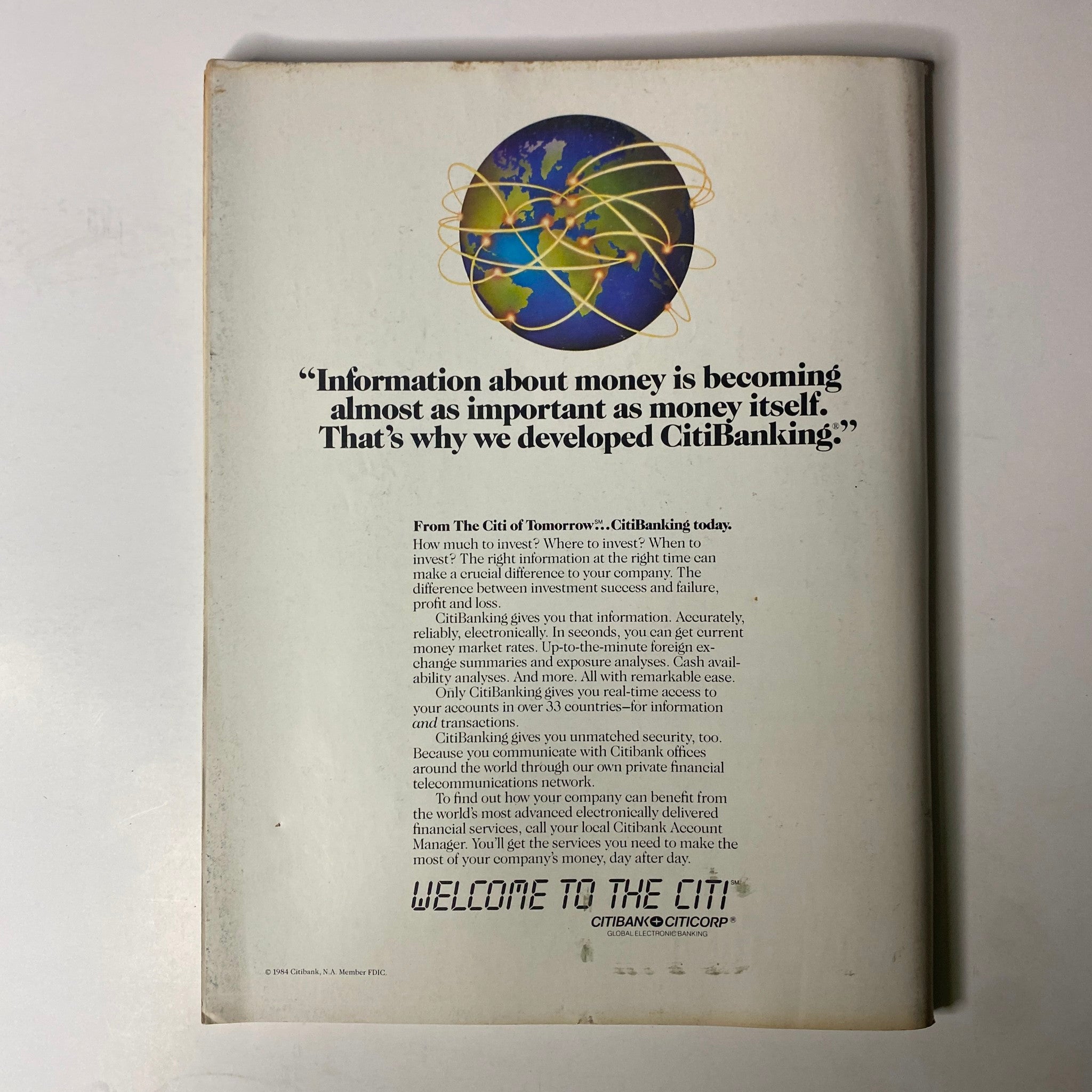Back cover of Forbes Magazine March 25, 1985 featuring an advertisement for CitiBanking highlighting the importance of timely financial information.