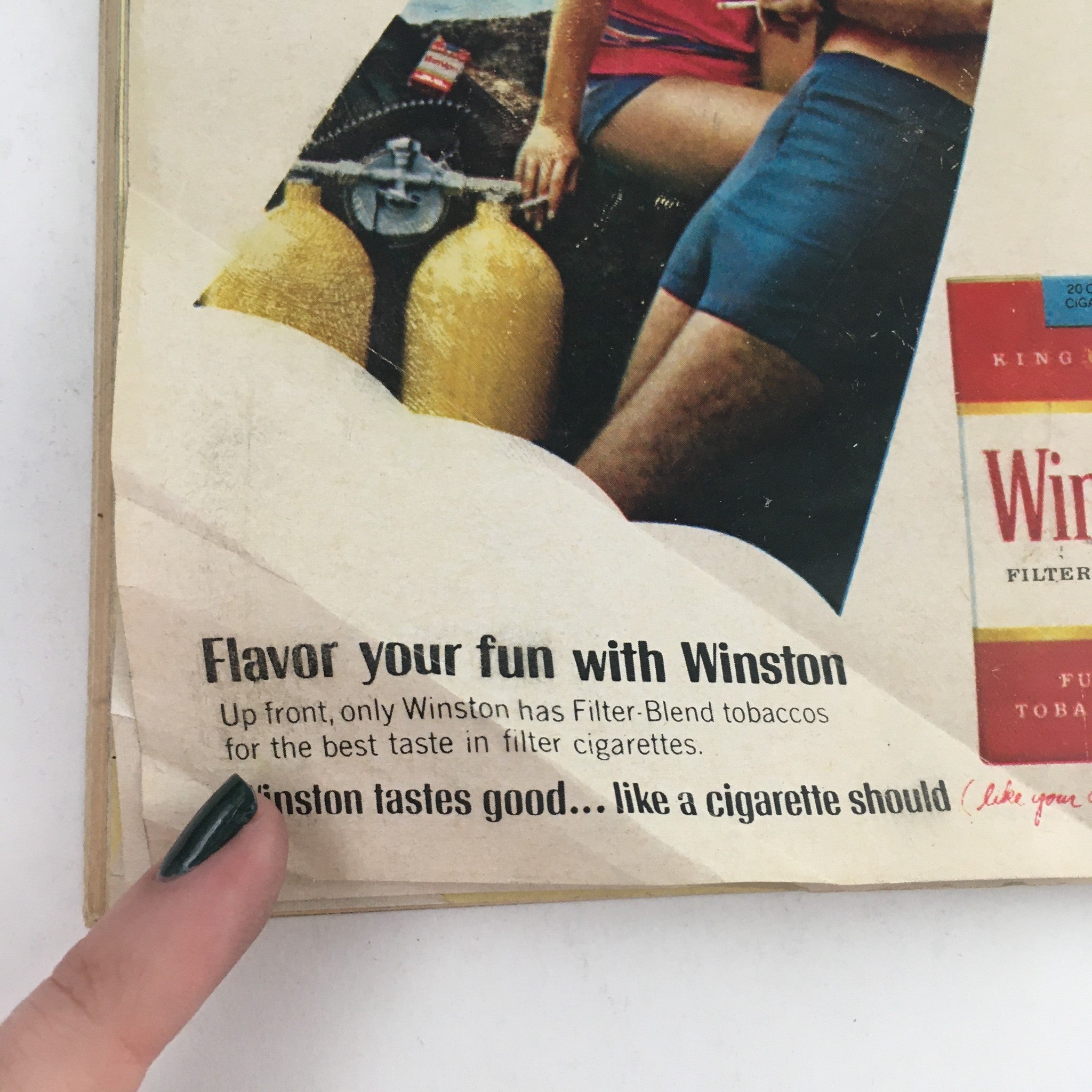 Feature page from TV Guide March 15 1969 with a promotional message for Winston cigarettes, reflecting advertising styles from the late 1960s.