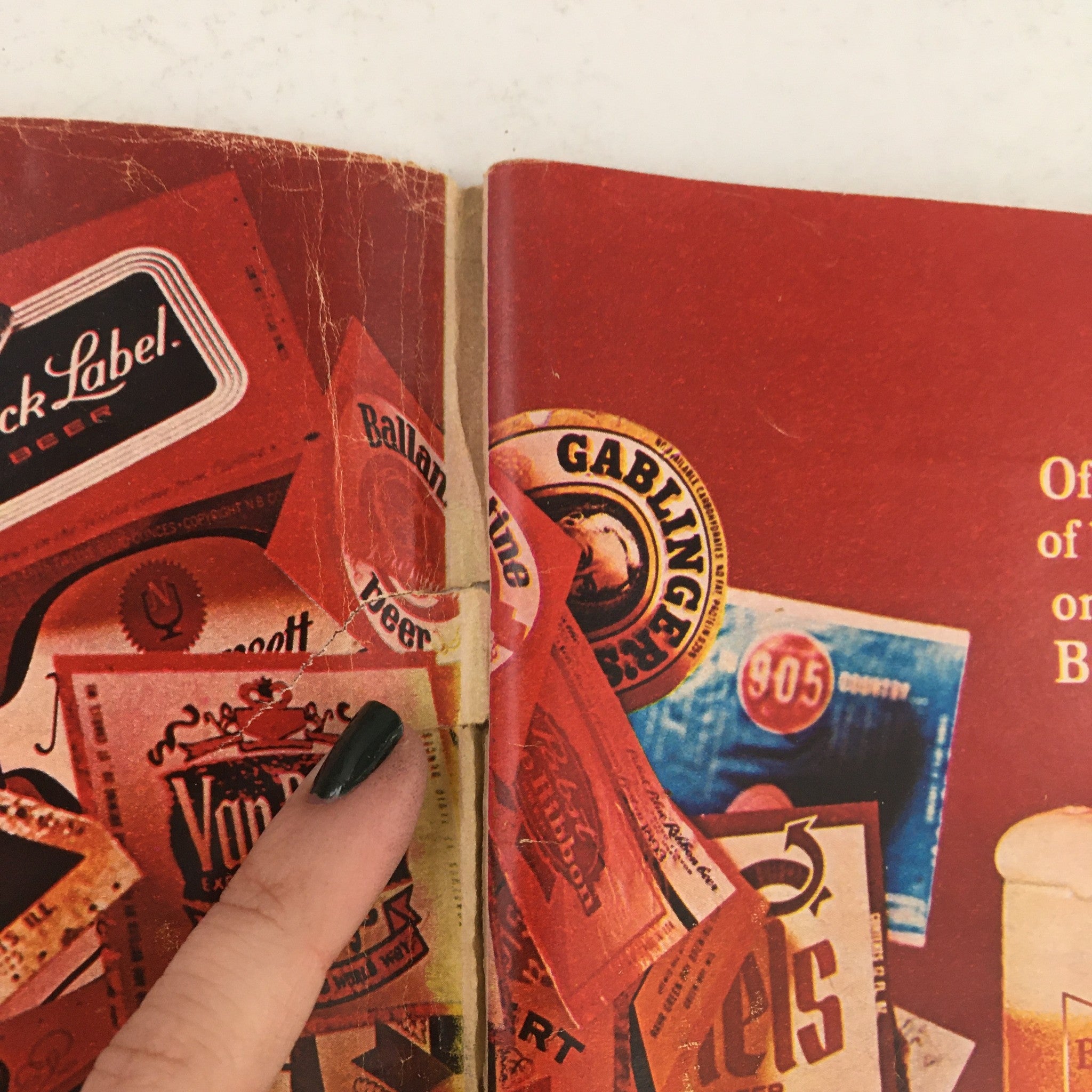 Close-up of vintage advertisements from the TV Guide June 1, 1968, showcasing various beer labels and brands, highlighting the cultural context of the time.