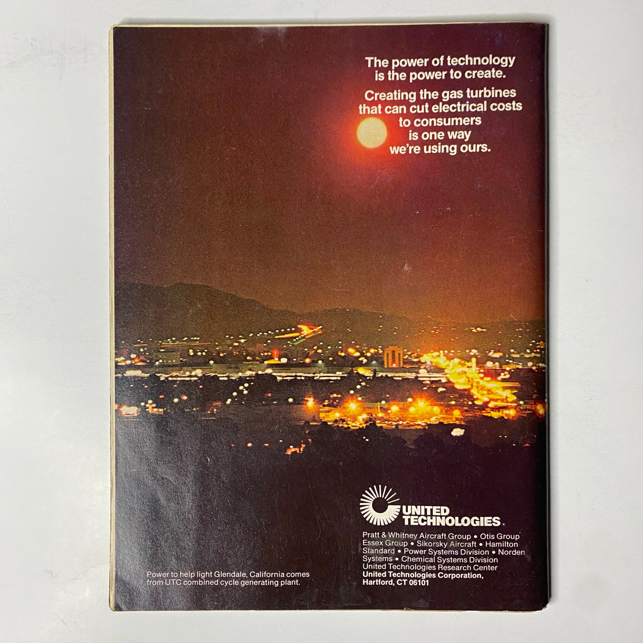 Back cover of Forbes Magazine June 26, 1978 featuring a United Technologies advertisement, showcasing a sunset over a city with the tagline about the power of technology and gas turbine innovations.