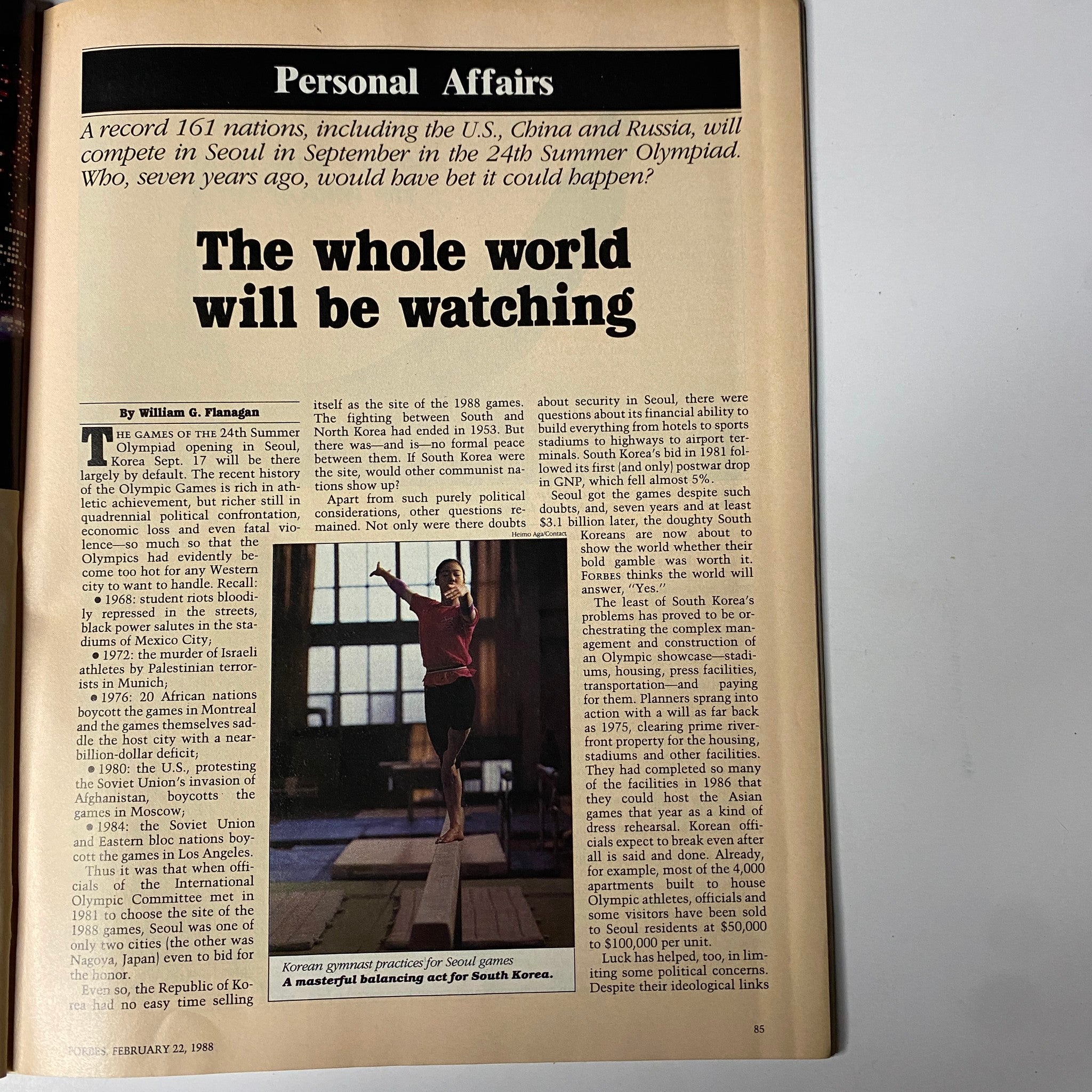 Article page from Forbes Magazine February 22, 1988 featuring the headline 'The whole world will be watching' discussing participation of nations in the 1988 Olympics.