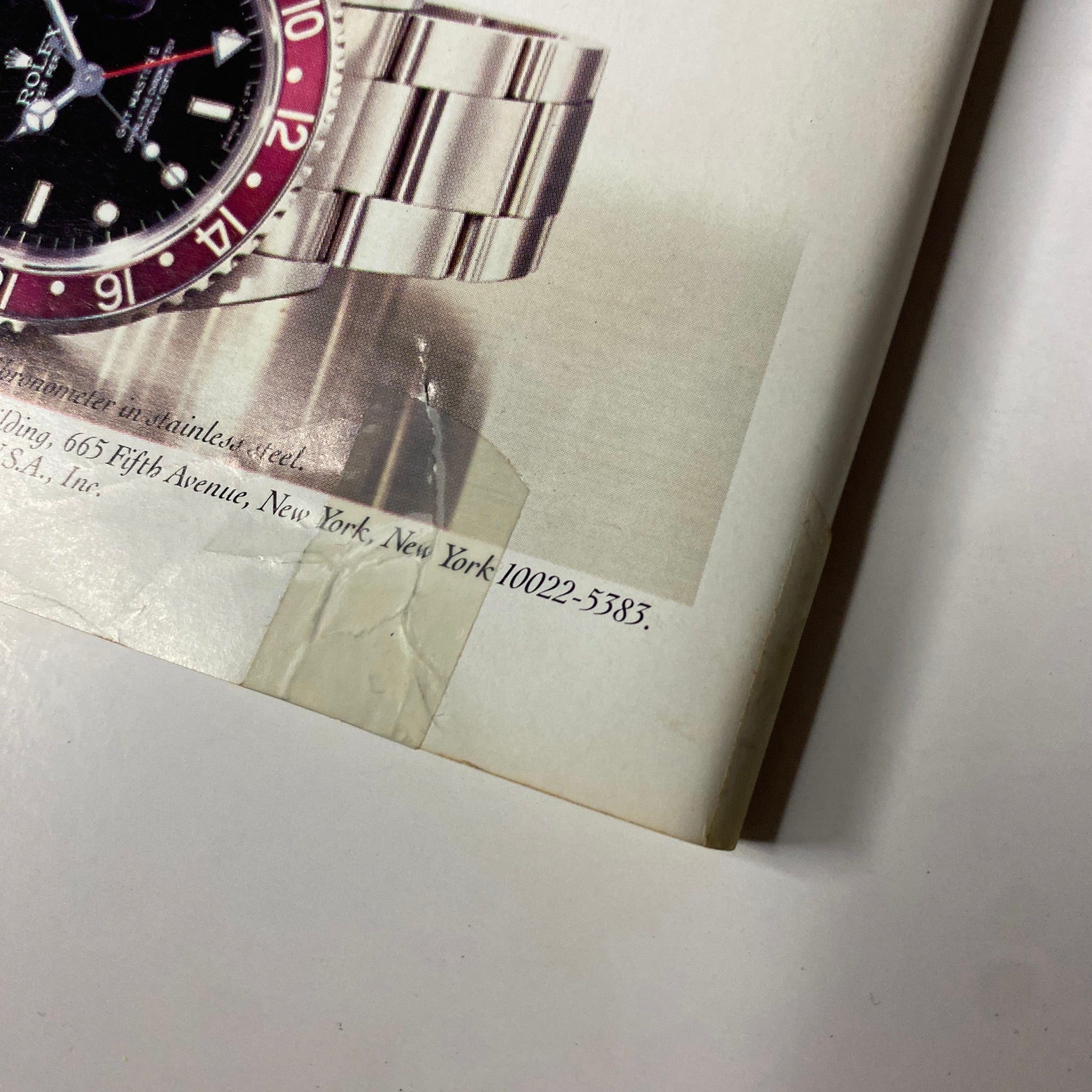 Close-up image from the advertisement in Forbes Magazine February 22, 1988 highlighting Rolex watch details and contact information.