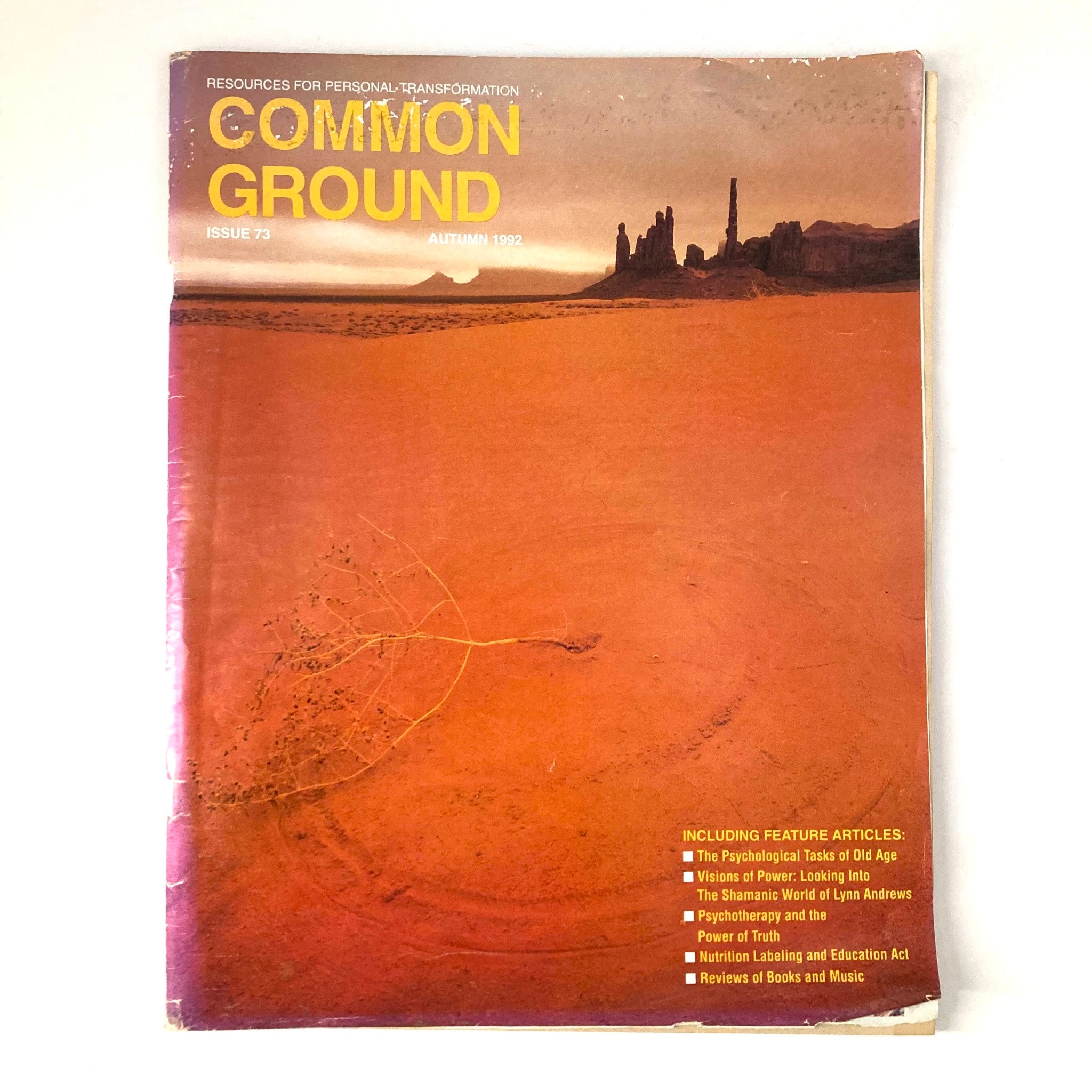 Cover of Common Ground Magazine Autumn 1992 Issue 73 featuring an artistic landscape and title prominently displayed. Highlights the theme of personal transformation and cultural exploration.