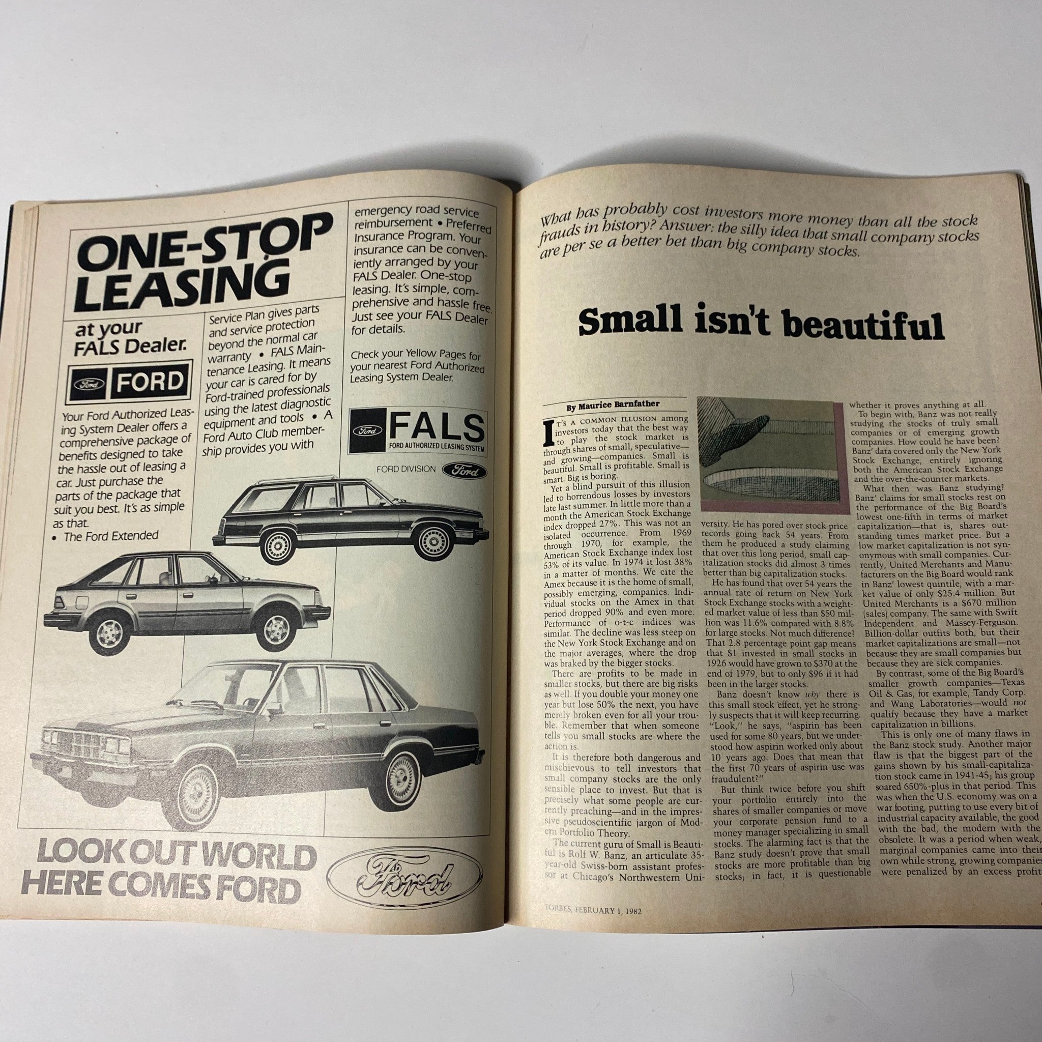 Opened page of Forbes Magazine, February 1, 1982, displaying an advertisement and an article titled 'Small isn't beautiful', discussing investment strategies and market dynamics.