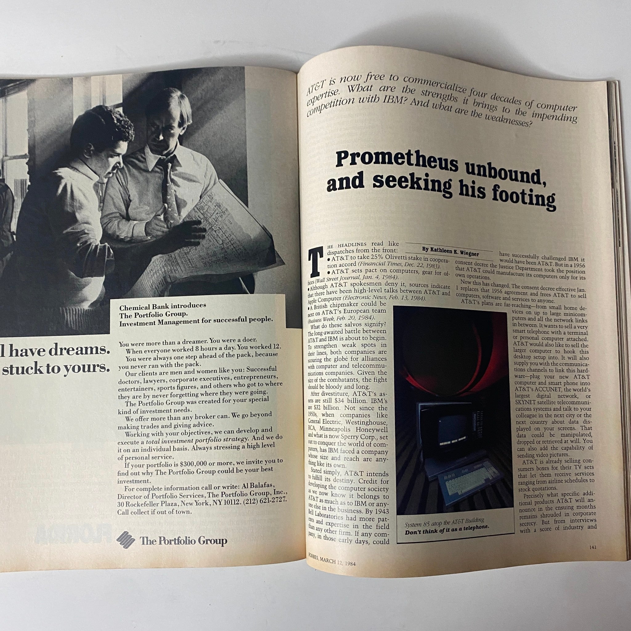 Inside spread of Forbes Magazine from March 12, 1984, highlighting an article titled 'Prometheus Unbound, and Seeking His Footing' about AT&T's evolution in the computer industry.