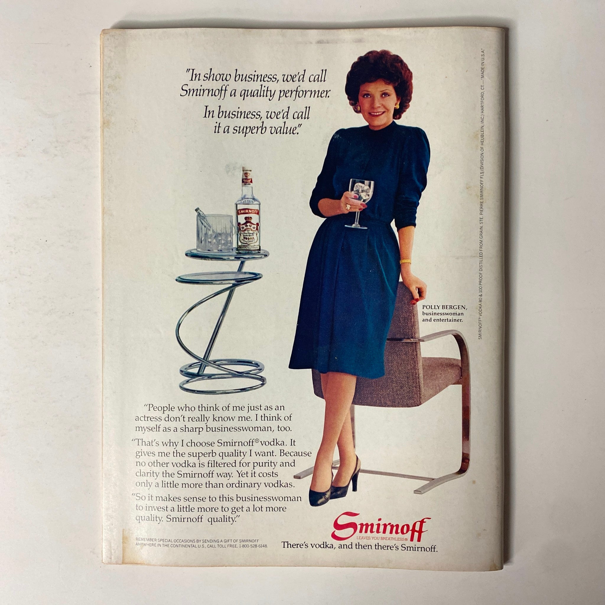 Back cover of Forbes Magazine, August 15, 1983, displaying an advertisement featuring Polly Bergen endorsing Smirnoff vodka.