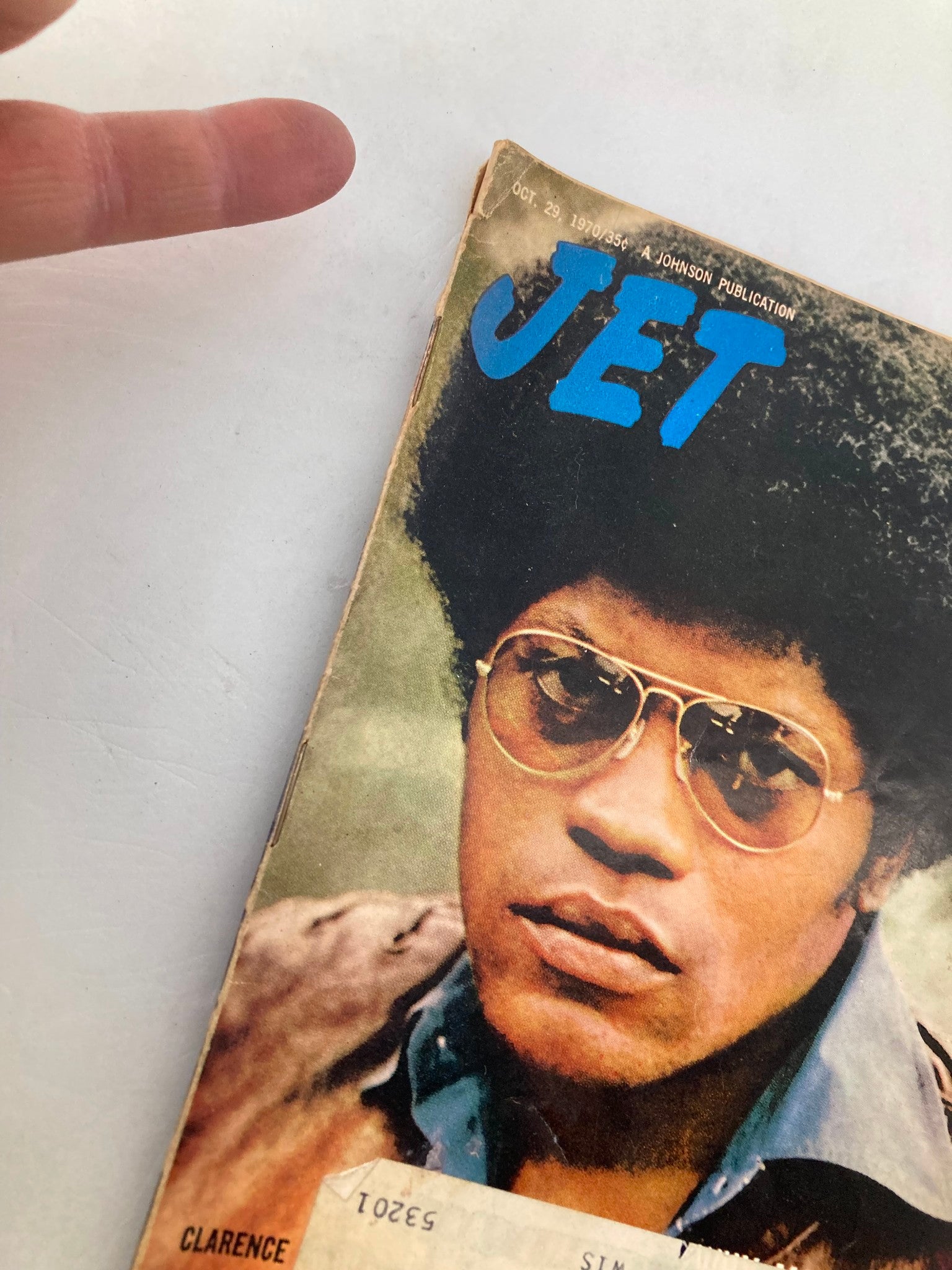 Close-up view of the cover of VTG Jet Magazine October 29 1970 Vol 39 #4, highlighting Clarence Williams with a stylish afro and sunglasses against a vintage background.