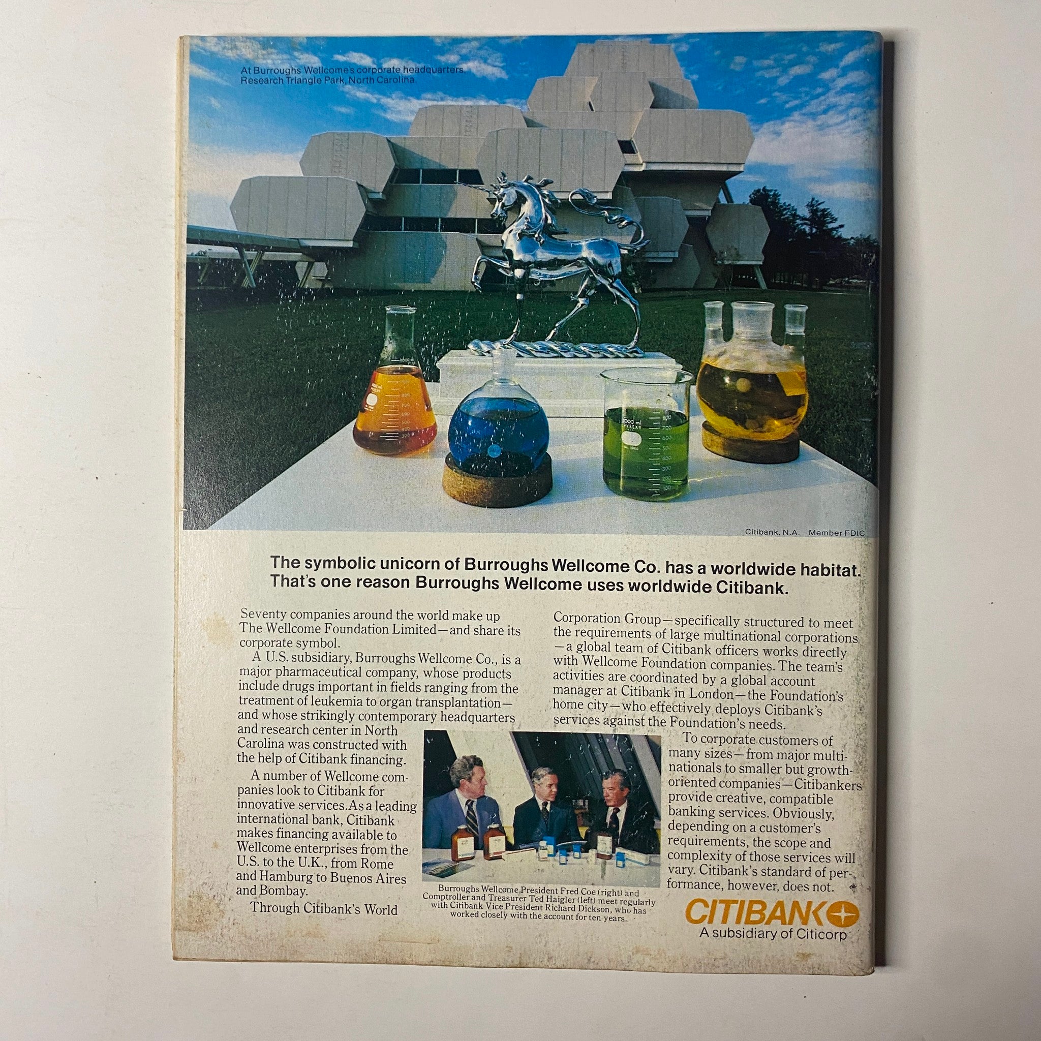 Back cover of Forbes Magazine from November 13, 1978, detailing an advertisement for Burroughs Wellcome Co. and Citibank, alongside an artistic image related to the companies.