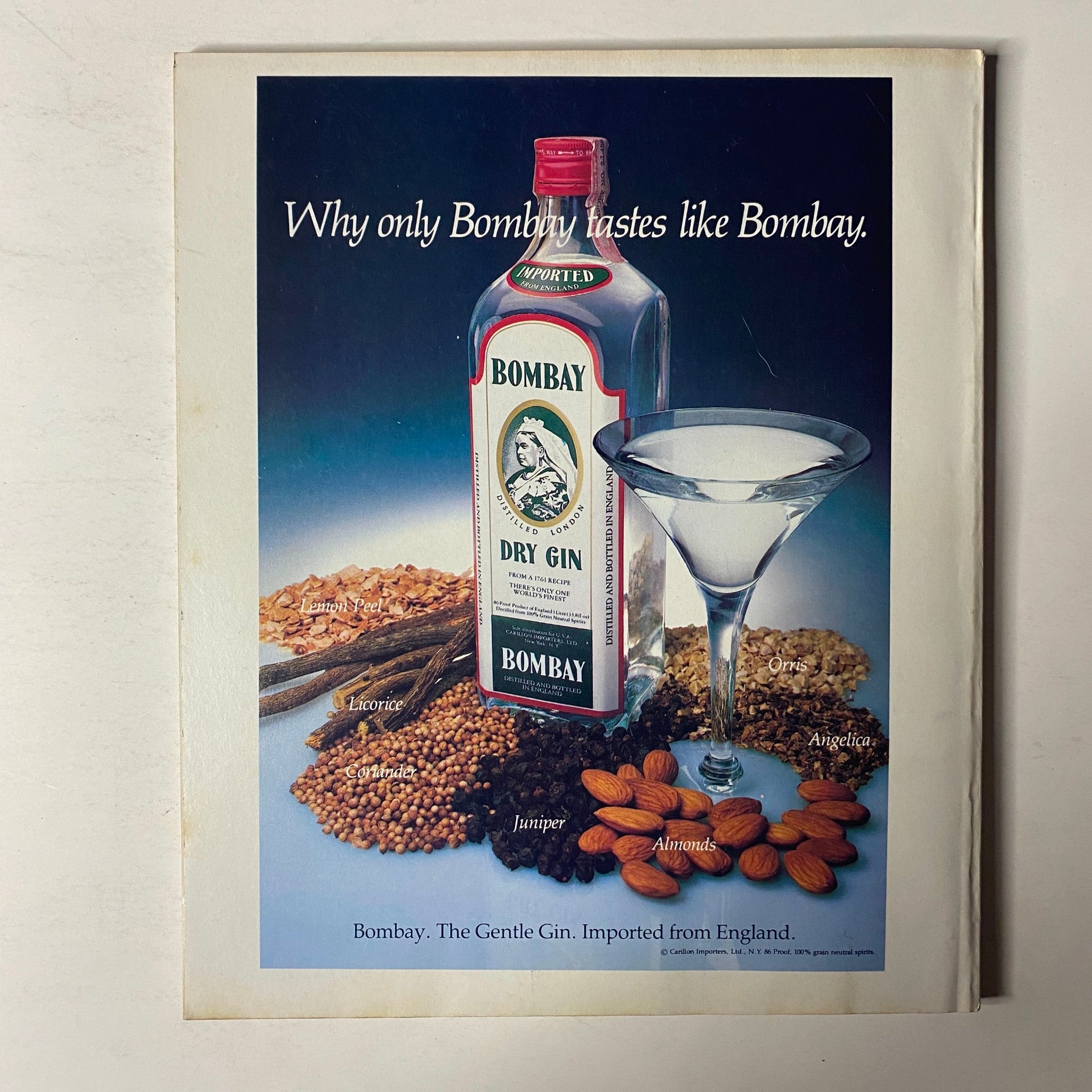 Advertisement for Bombay Dry Gin from Fortune Magazine October 19, 1981, showcasing the gin bottle and key ingredients like juniper, almonds, and lemon peel.