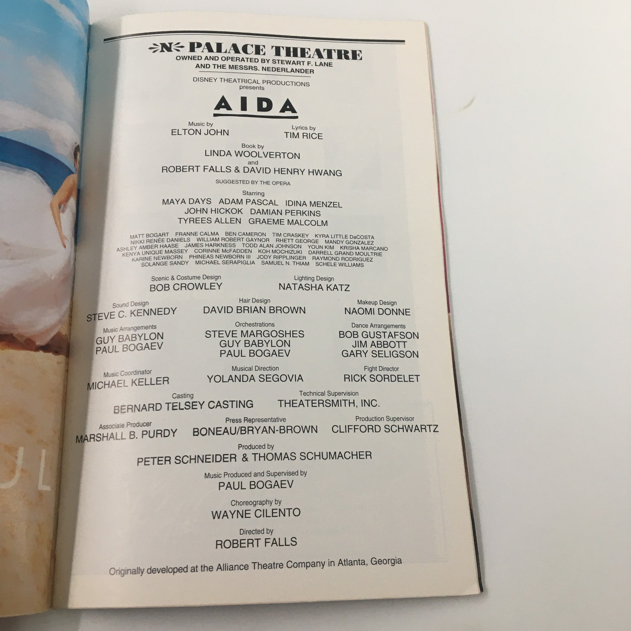 Inside page of the Playbill for Aida, listing the production team including Elton John, Robert Falls, and details about the theatrical cast.
