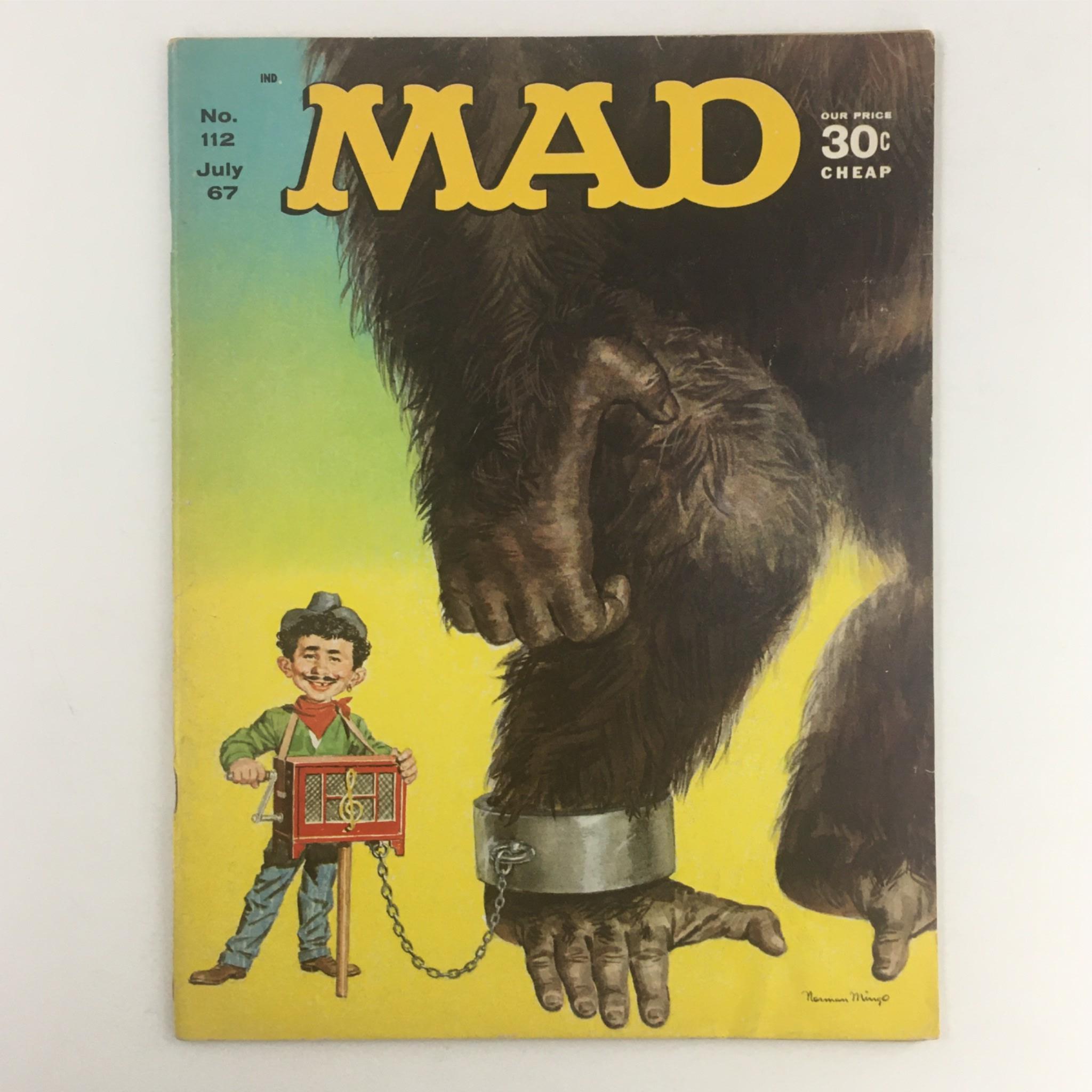 Mad Magazine July 1967 No. 112 featuring the cover art titled 'Chained Ape', depicting a cartoon character with a wooden puppet and a giant ape in the background, underlining the humor and satire of the magazine.