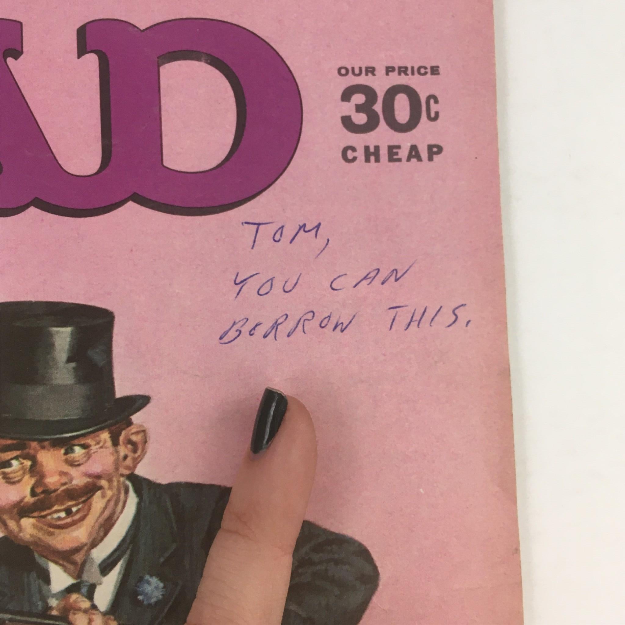 Close-up of the Mad Magazine July 1966 No. 104 cover showing a handwritten note mentioning 'Tom, you can borrow this' with a character in a top hat.