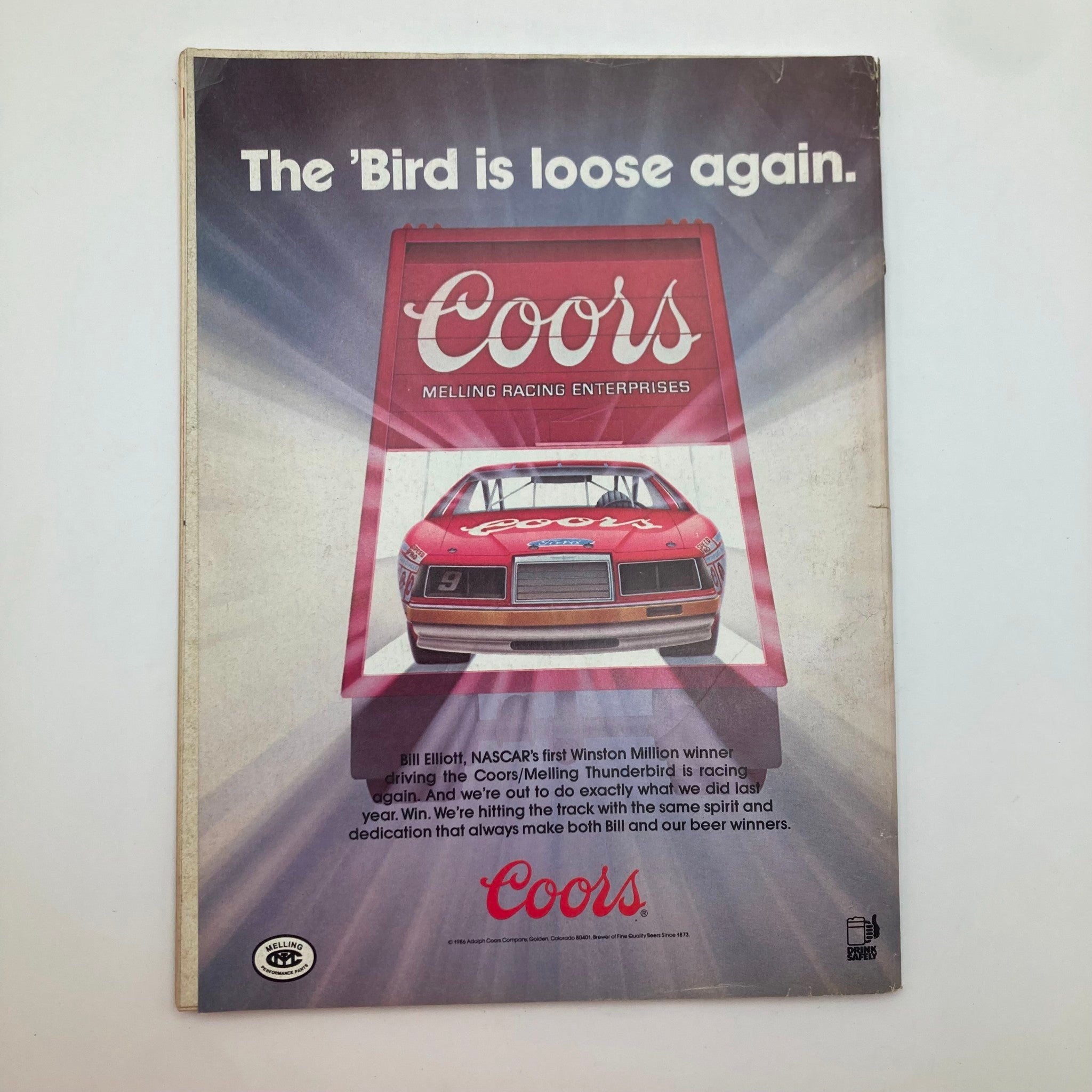 Back cover of Stock Car Racing Magazine May 1986, showcasing a Coors advertisement with a racing Thunderbird, emphasizing Bill Elliott and Melling Racing Enterprises.