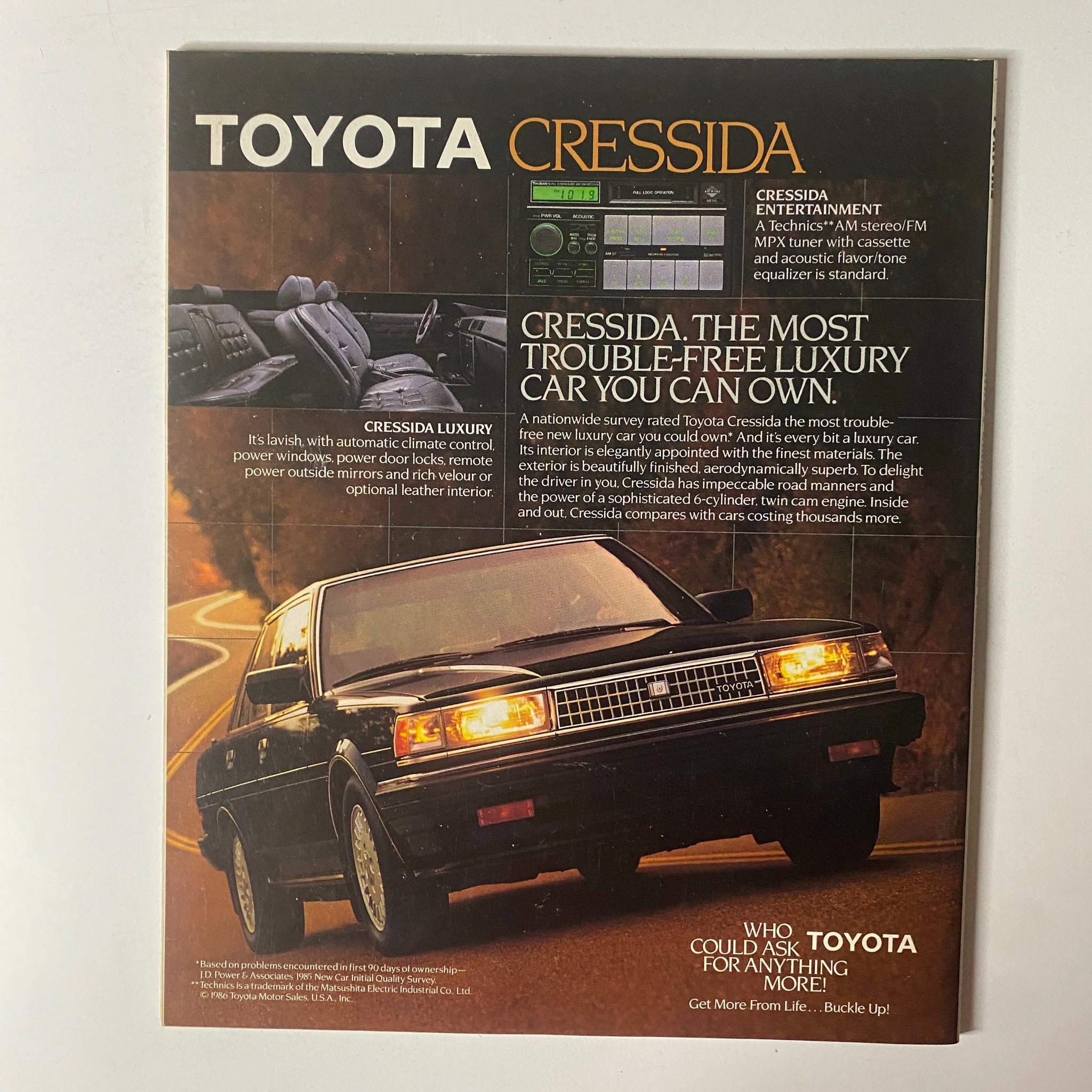 Fortune Magazine February 16, 1987 featuring a vintage advertisement for the Toyota Cressida. The ad highlights the luxury features and trouble-free reputation of the Cressida, showcasing its elegant design, dashboard entertainment system, and comfortable interior.