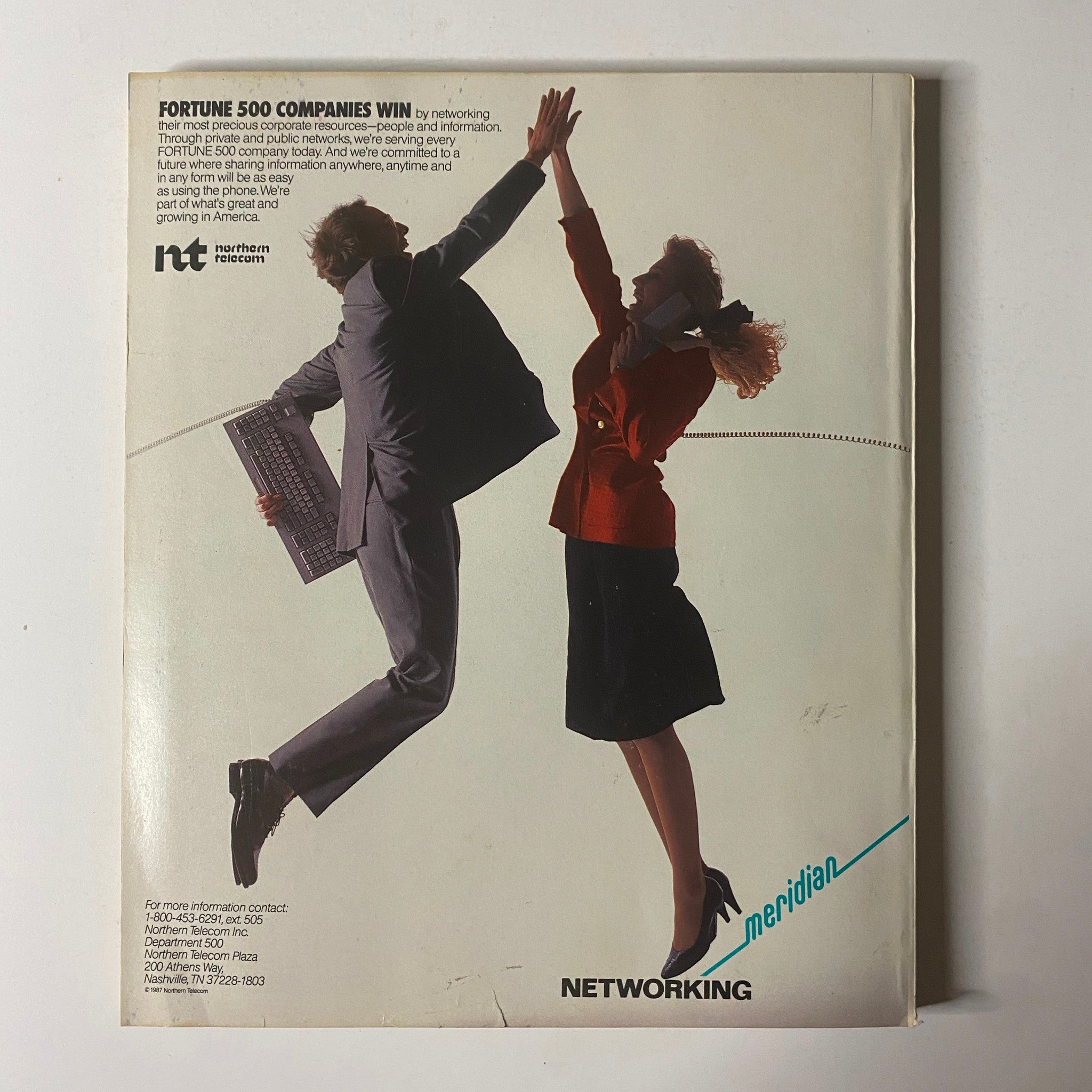 Fortune Magazine April 27, 1987, presenting an advertisement related to networking for Fortune 500 companies, representing corporate collaboration.