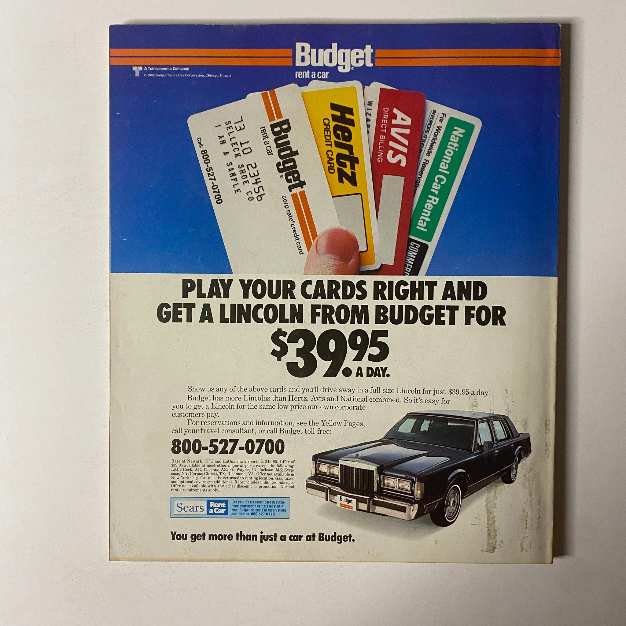 Back cover of Fortune Magazine April 15, 1985 featuring an advertisement for Budget Rent A Car promotions.
