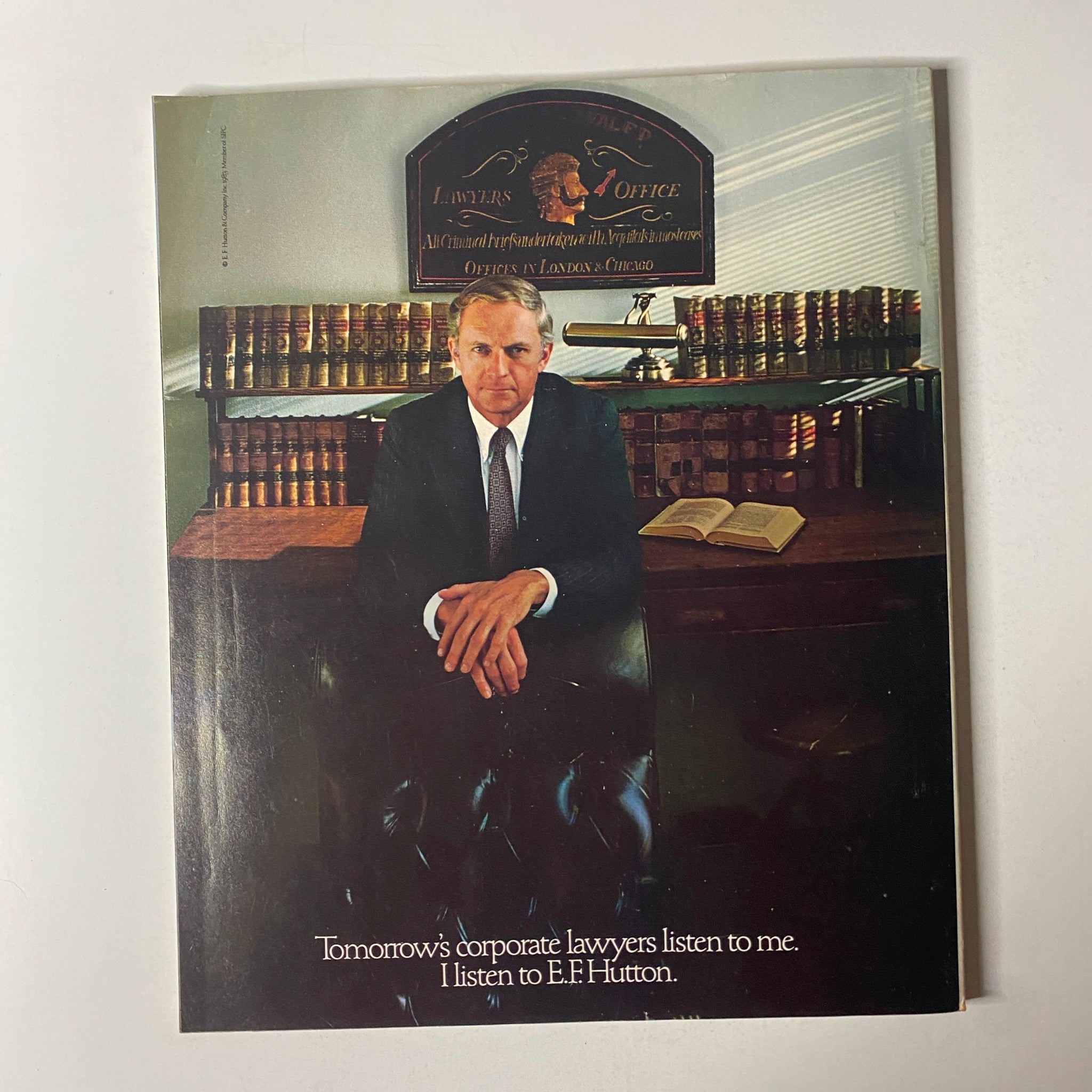 Back cover of Fortune Magazine October 17, 1983 featuring a corporate lawyer with the caption 'Tomorrow's corporate lawyers listen to me. I listen to E.F. Hutton.' The image illustrates the professional and authoritative theme prevalent in the corporate world during that era.