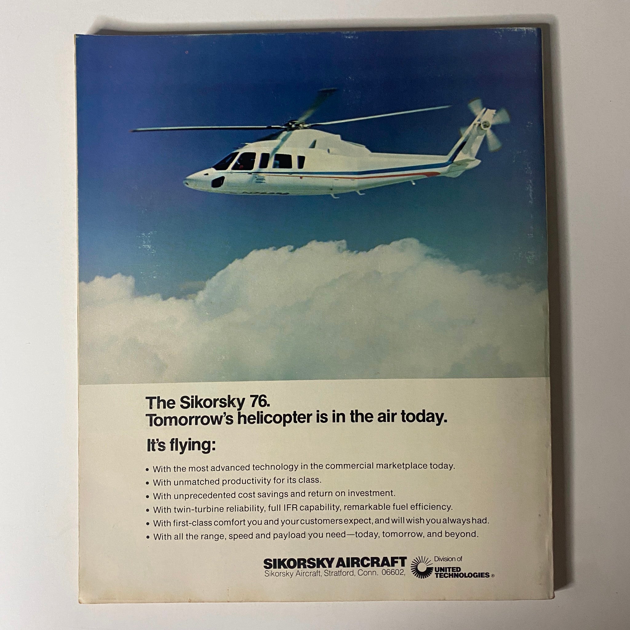 Back cover of Fortune Magazine July 1977 featuring the Sikorsky 76 helicopter advertisement highlighting its advanced technology and capabilities.
