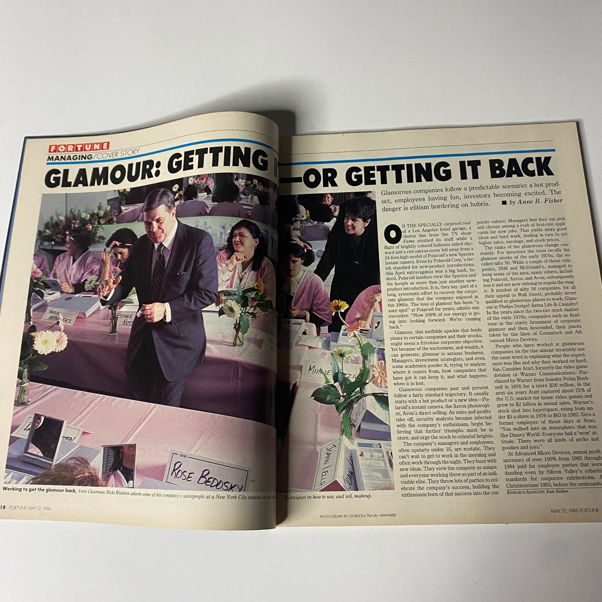 Fortune Magazine May 12, 1986 feature article 'Glamour: Getting It – or Getting It Back' with a corporate event scene, highlighting Jerry Sanders and attendees engaged in discussions, showcasing corporate culture and leadership dynamics of the mid-80s.