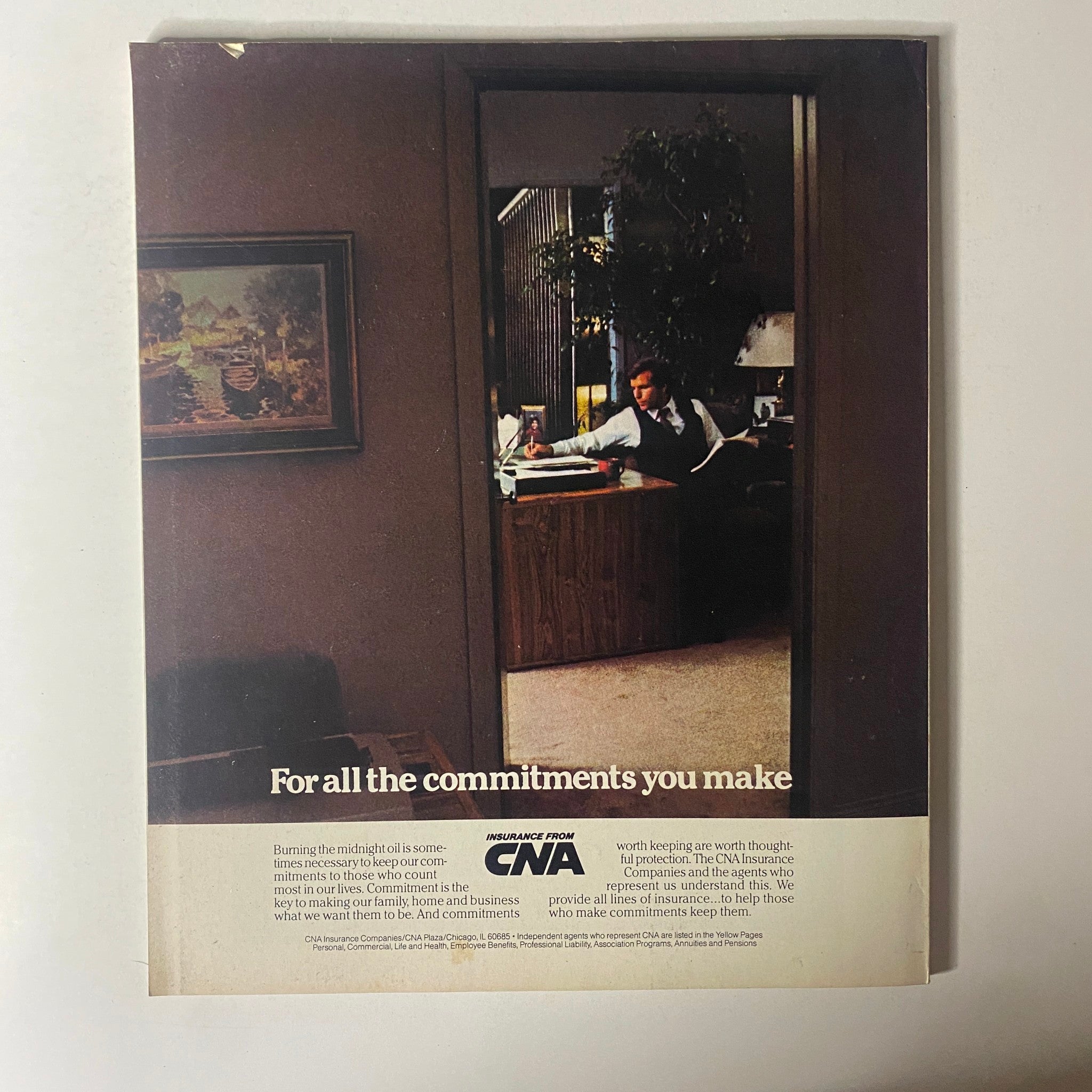 Advertisement page from Fortune Magazine, July 11, 1983, promoting commitment to business and family with a visual of a man in an office setting, reflecting corporate life of the era.