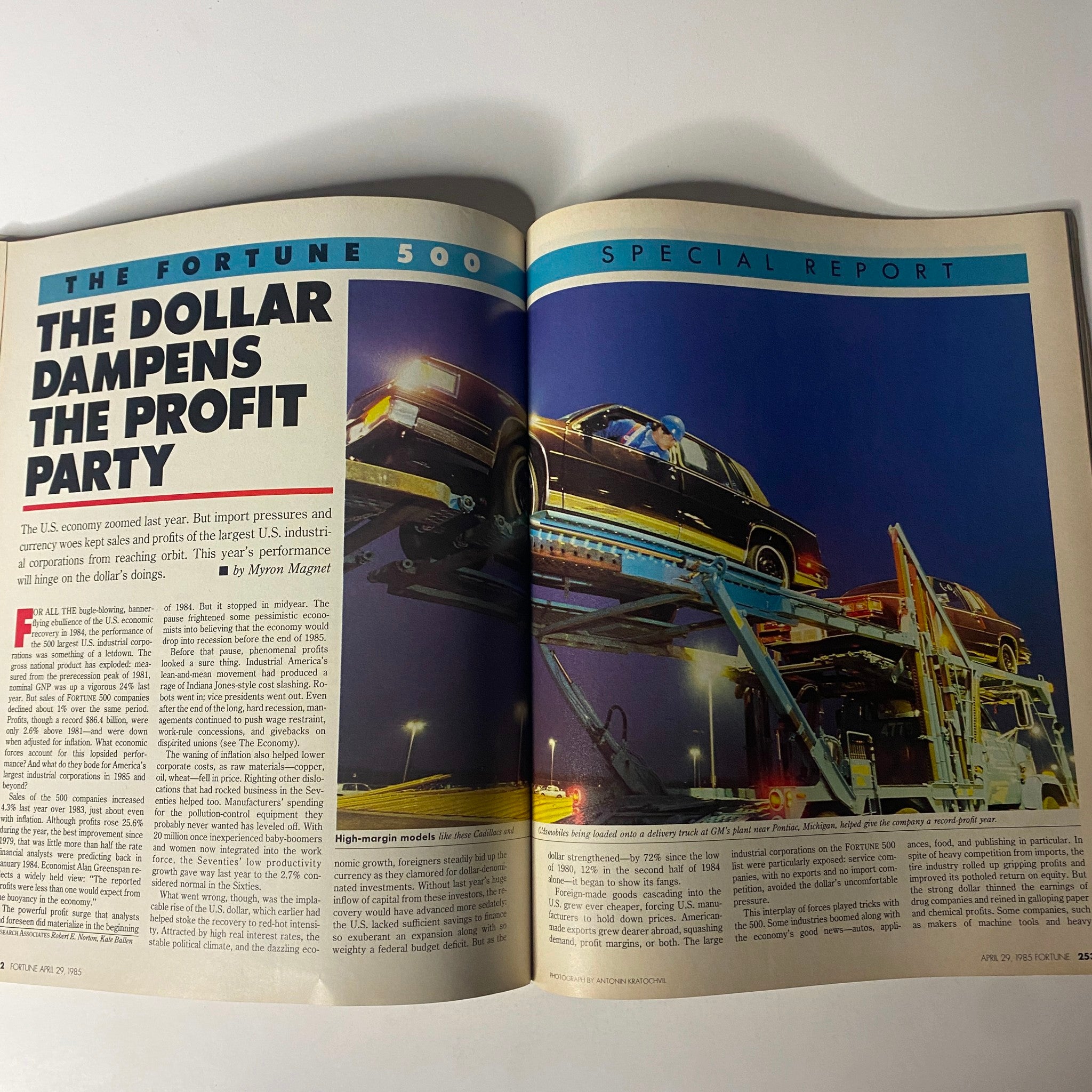 Inner page of Fortune Magazine April 29, 1985 with the article 'The Dollar Dampens the Profit Party,' discussing economic pressures on the largest U.S. corporations.