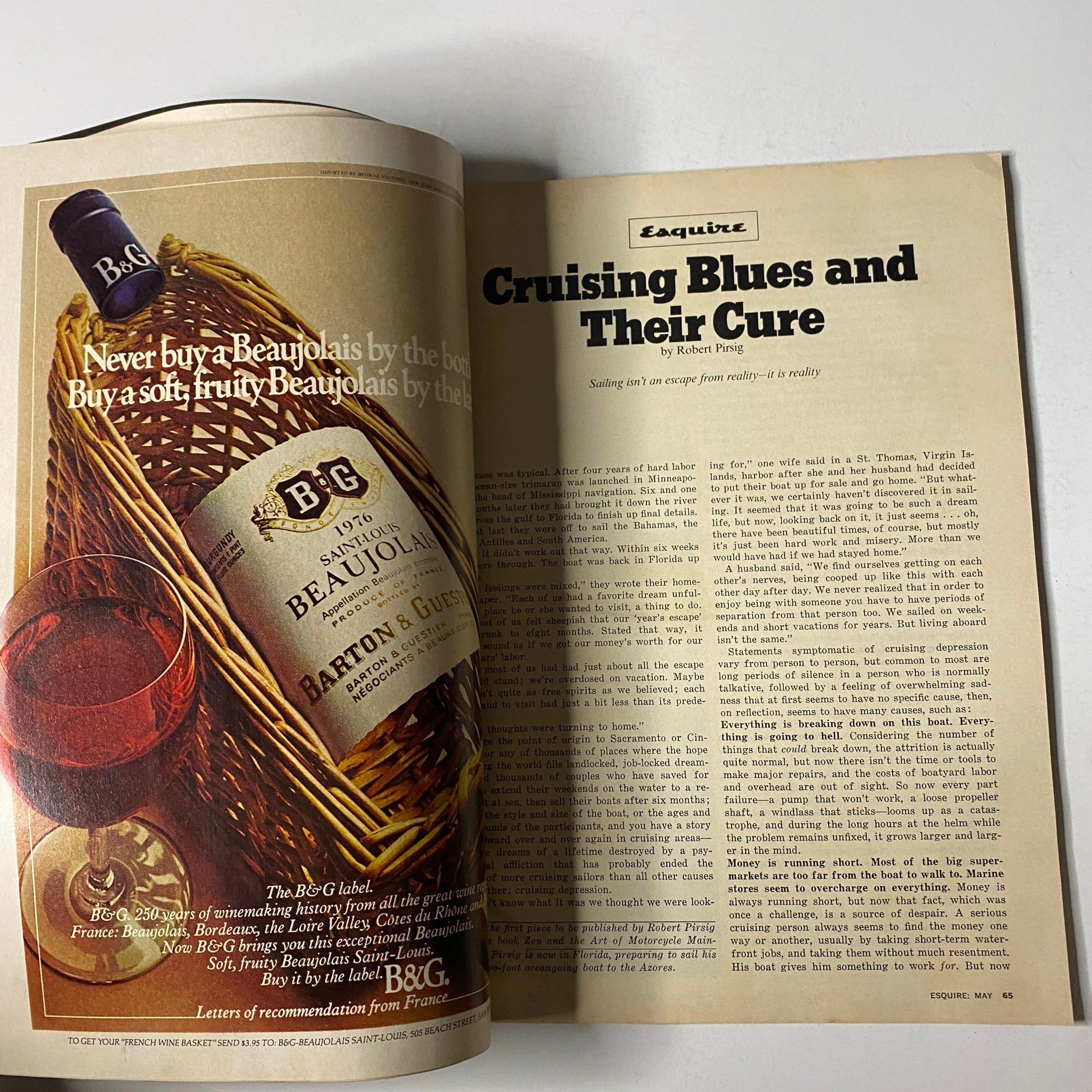 Article page from Esquire Magazine May 1977 featuring the title 'Cruising Blues and Their Cure' by Robert Pirsig, highlighting a wine advertisement alongside text discussing life experiences.