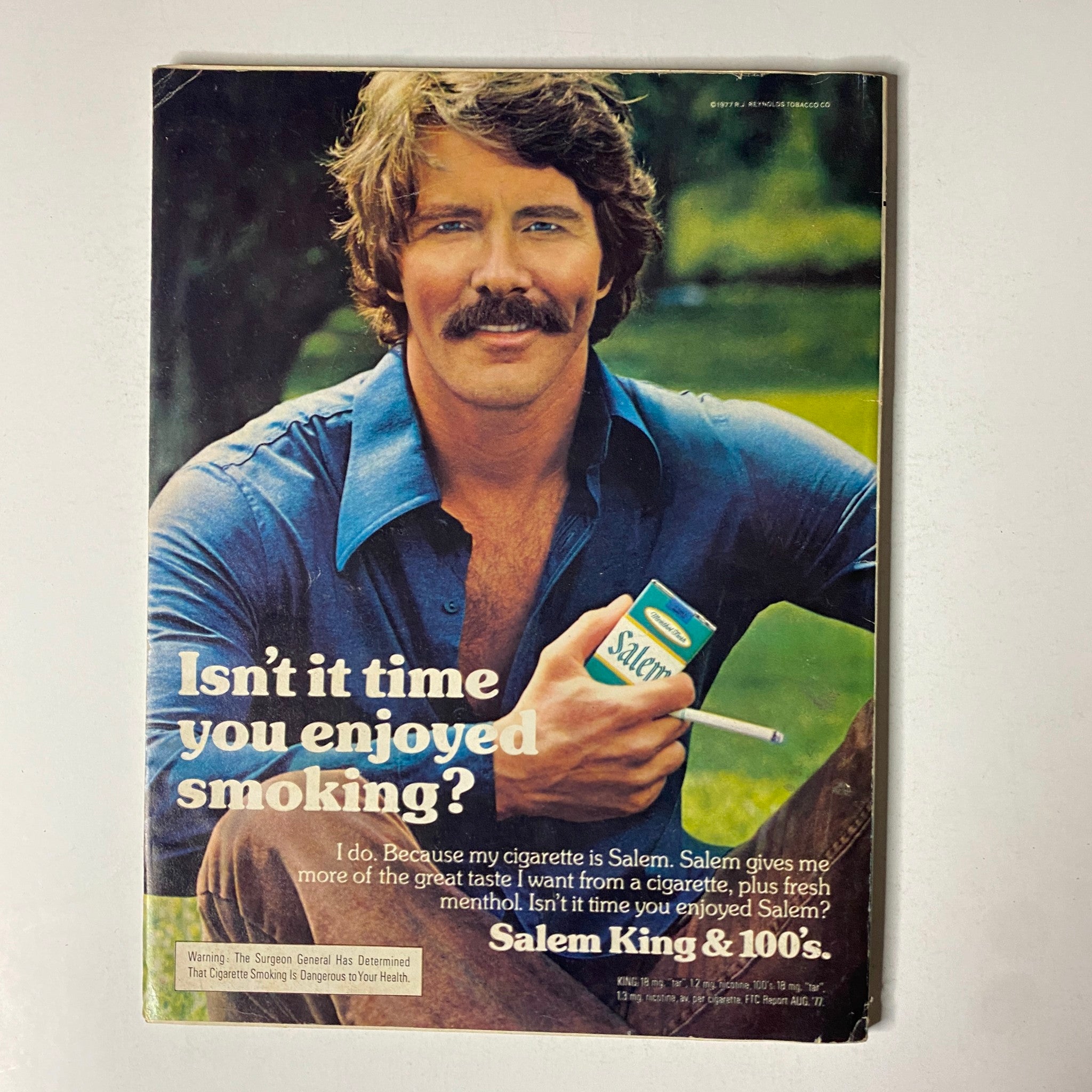 Advertisement page from Esquire Magazine January 1978 featuring a man promoting Salem cigarettes with the caption 'Isn’t it time you enjoyed smoking?', embodying the marketing style of the 1970s.