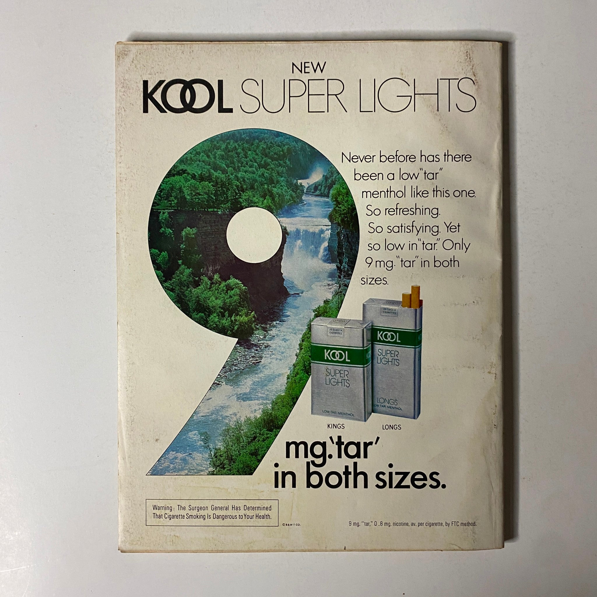 Back cover of Esquire Magazine October 1977 featuring an advertisement for Kool Super Lights cigarettes, highlighting low tar content and refreshing menthol.