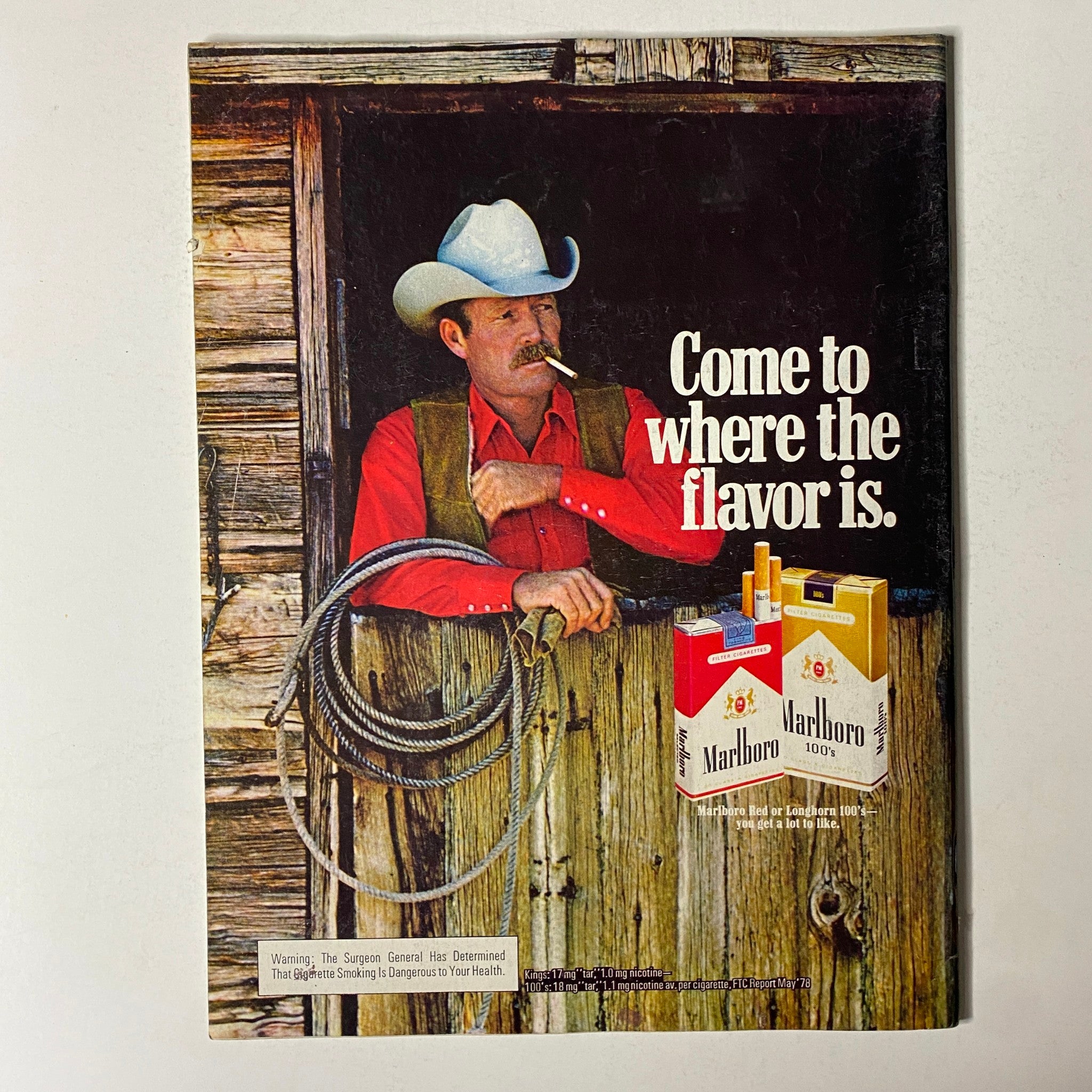 Advertisement from Esquire Magazine March 13, 1979 for Marlboro cigarettes featuring a cowboy holding a lasso, promoting the slogan 'Come to where the flavor is'.