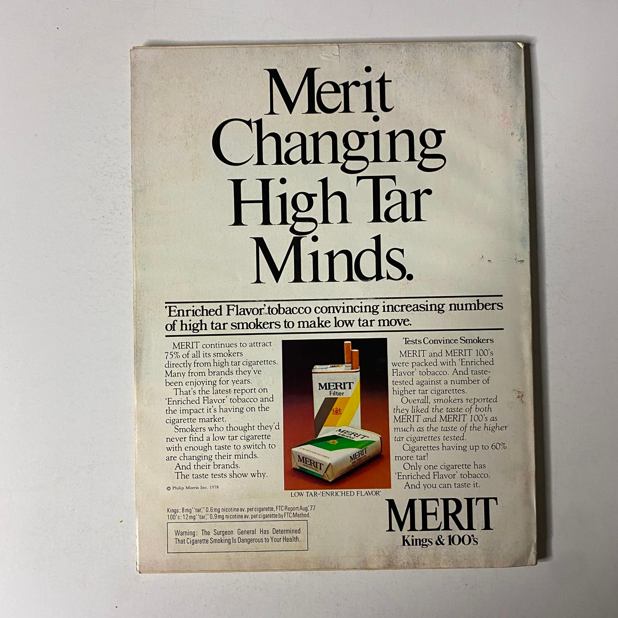 Esquire Magazine February 1978 advertisement for Merit cigarettes promoting low tar options, showcasing the brand's appeal to high tar smokers.