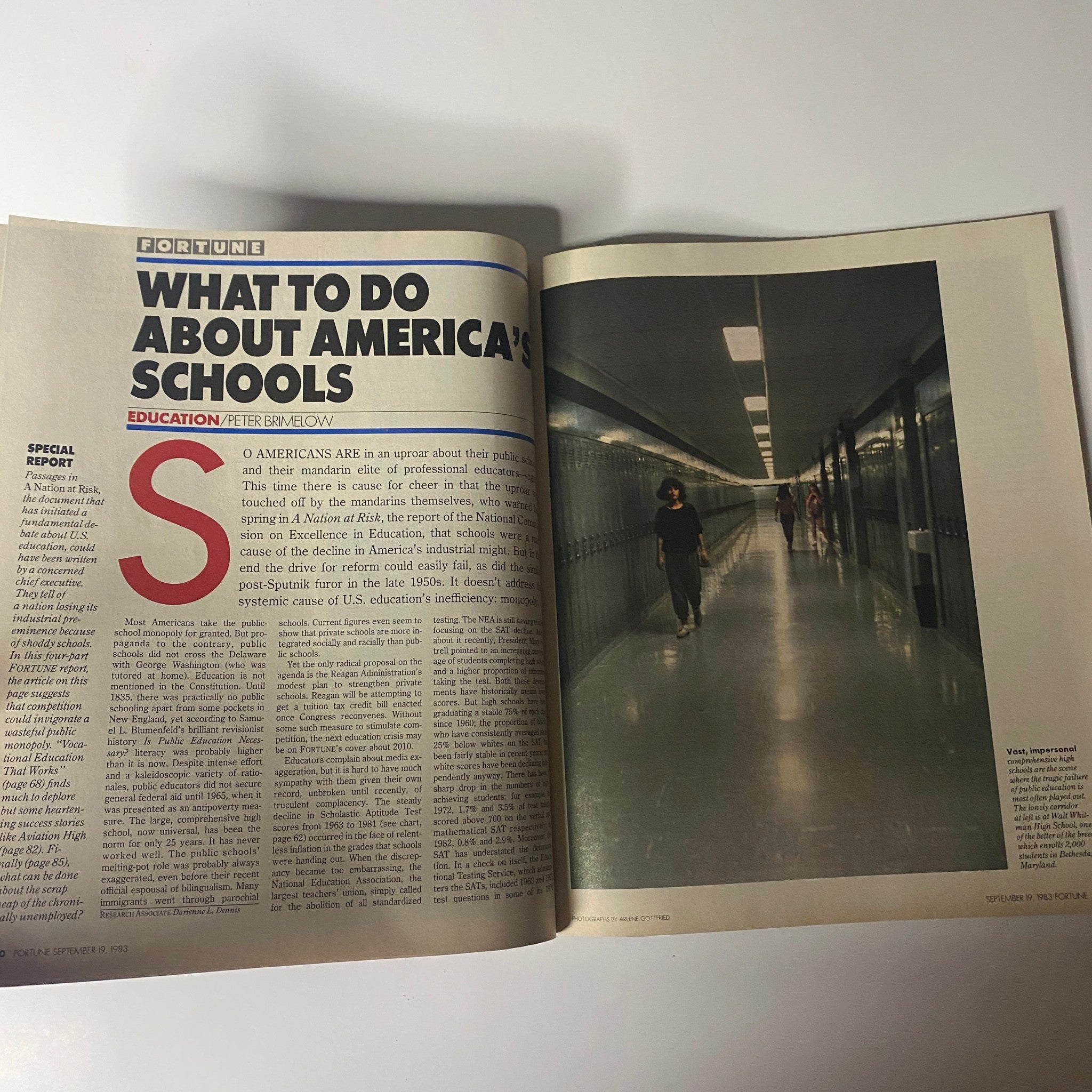 Inside view of a vintage Fortune Magazine, September 19, 1983, featuring the article 'What To Do About America's Schools' by Peter Brimelow, discussing educational reform and challenges.