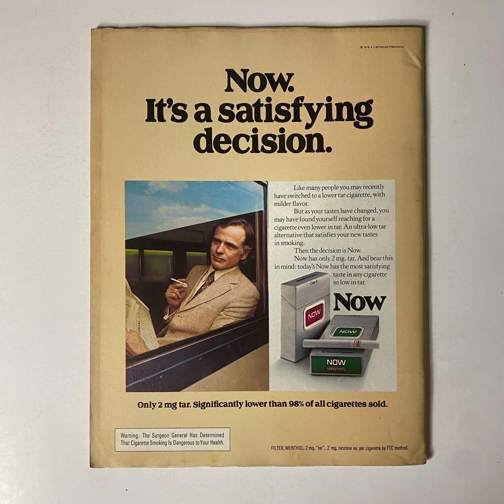 Esquire Magazine July 4, 1978 advertisement for Now cigarettes highlighting the benefits of low tar options with a sophisticated man portrayed.