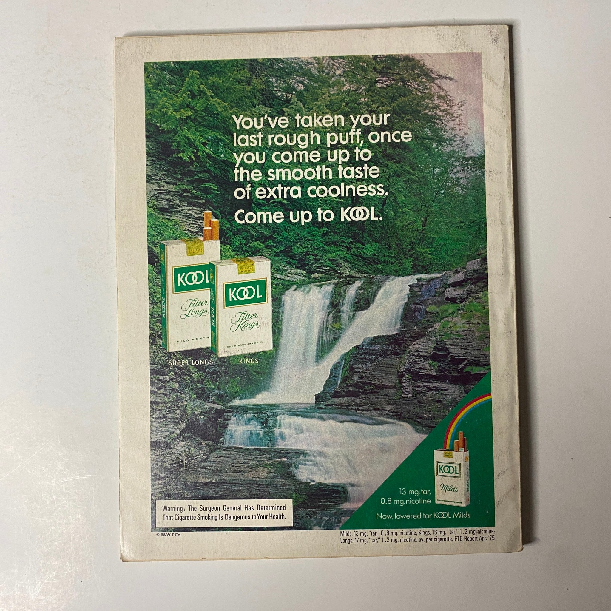Back cover of Esquire Magazine March 1976 displaying an advertisement for Kool cigarettes with a scenic background.