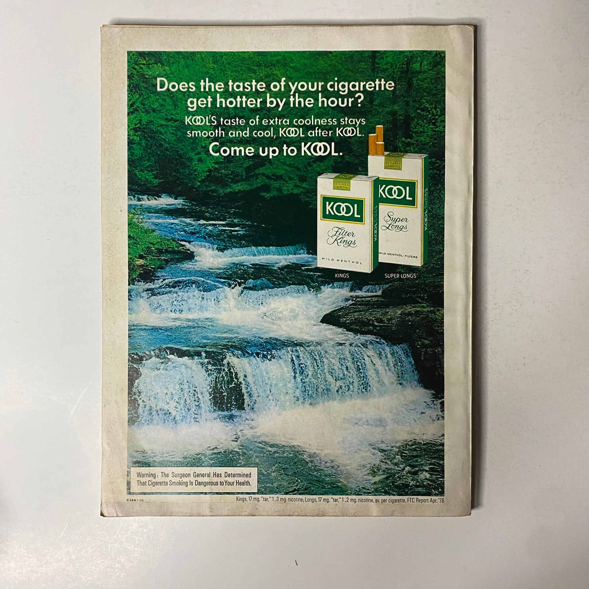 Back cover of the October 1976 Esquire Magazine featuring a Kool Cigarettes advertisement, emphasizing its smooth taste and coolness.