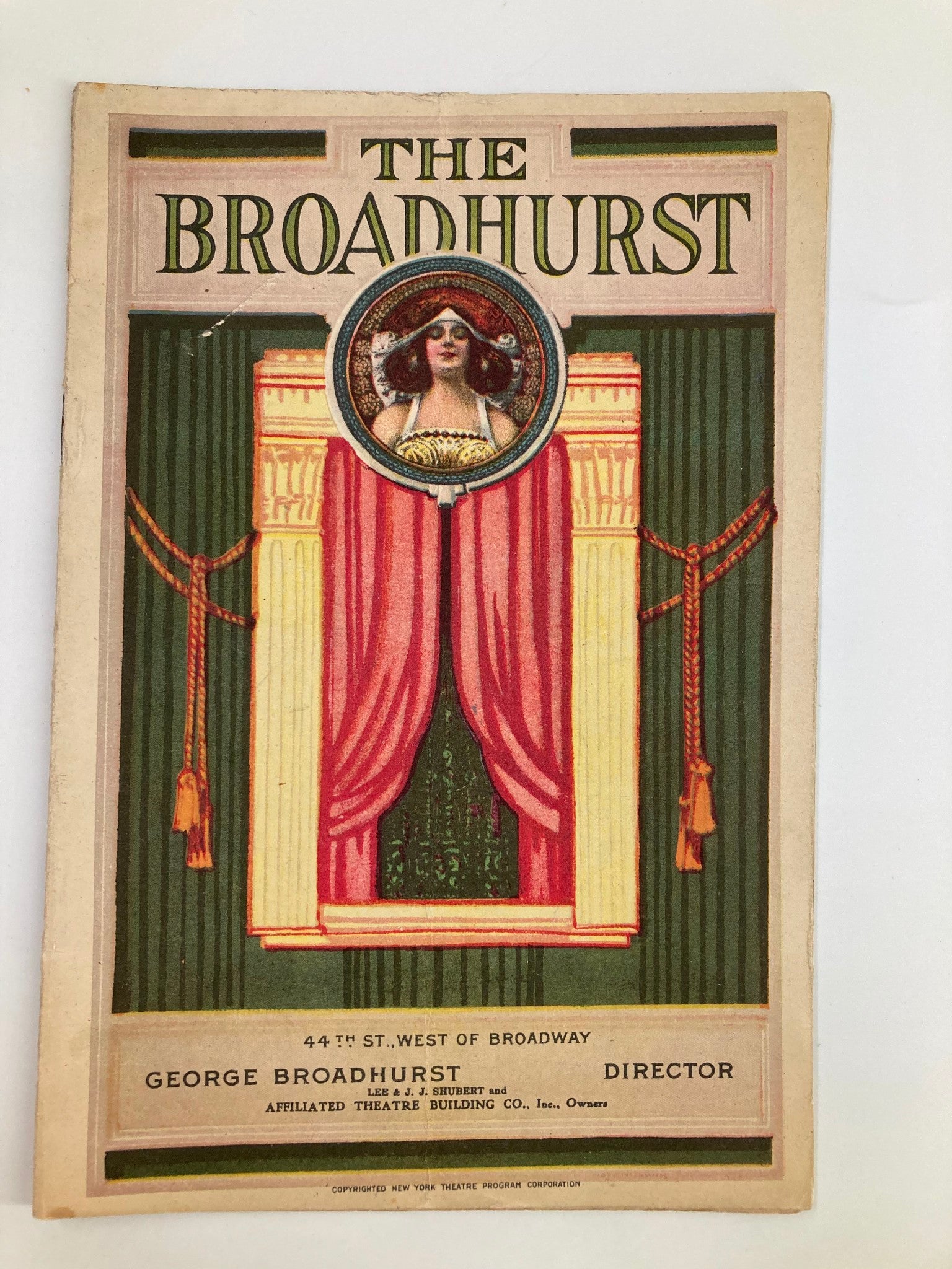 Cover of the 1921 Broadhurst Theatre program featuring the title 'The Broadhurst' with decorative elements and artistic design.