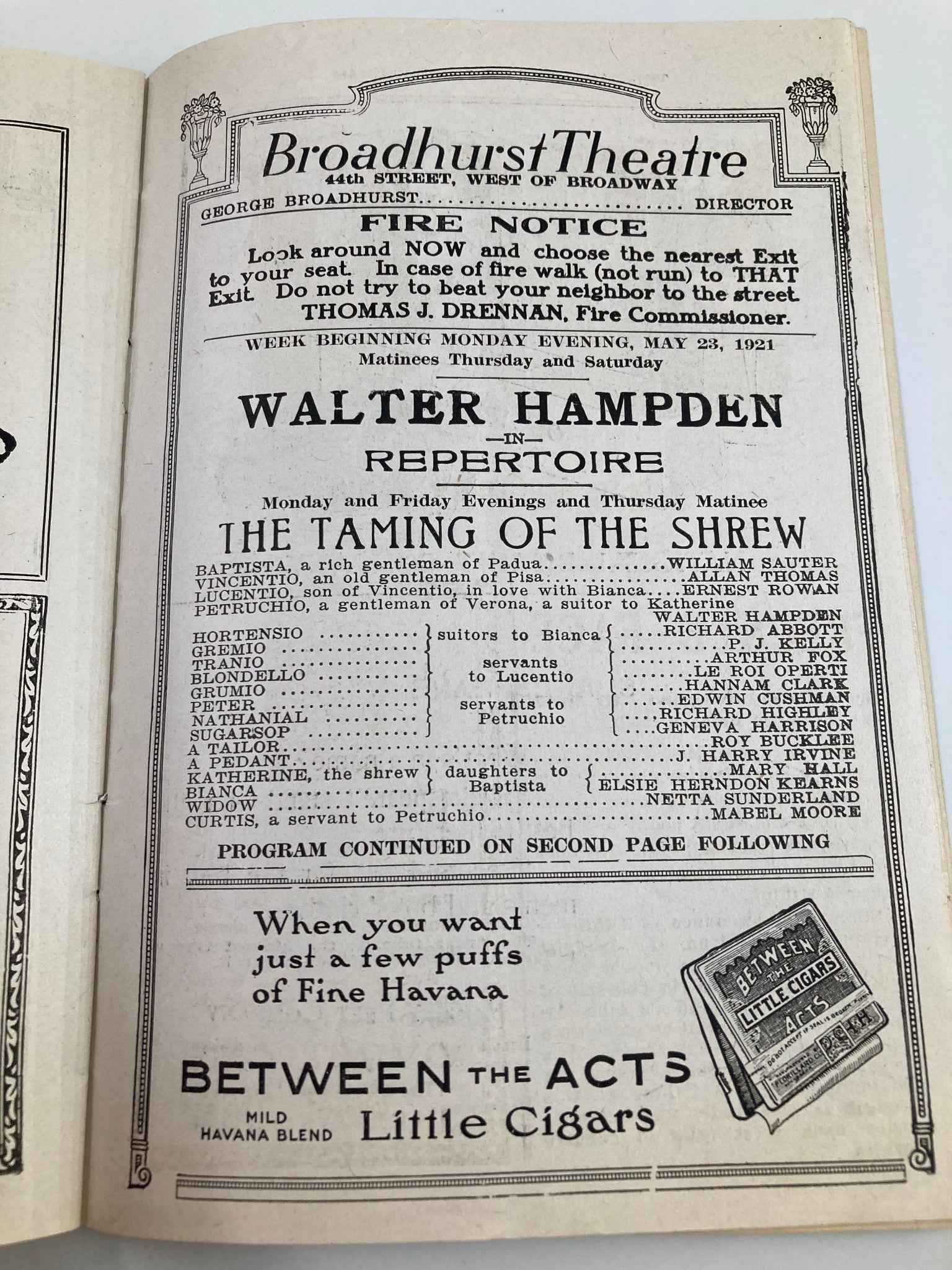 Information page from the 1921 Broadhurst Theatre program detailing Walter Hampden's performance in 'The Taming of The Shrew' with schedule and exit information.