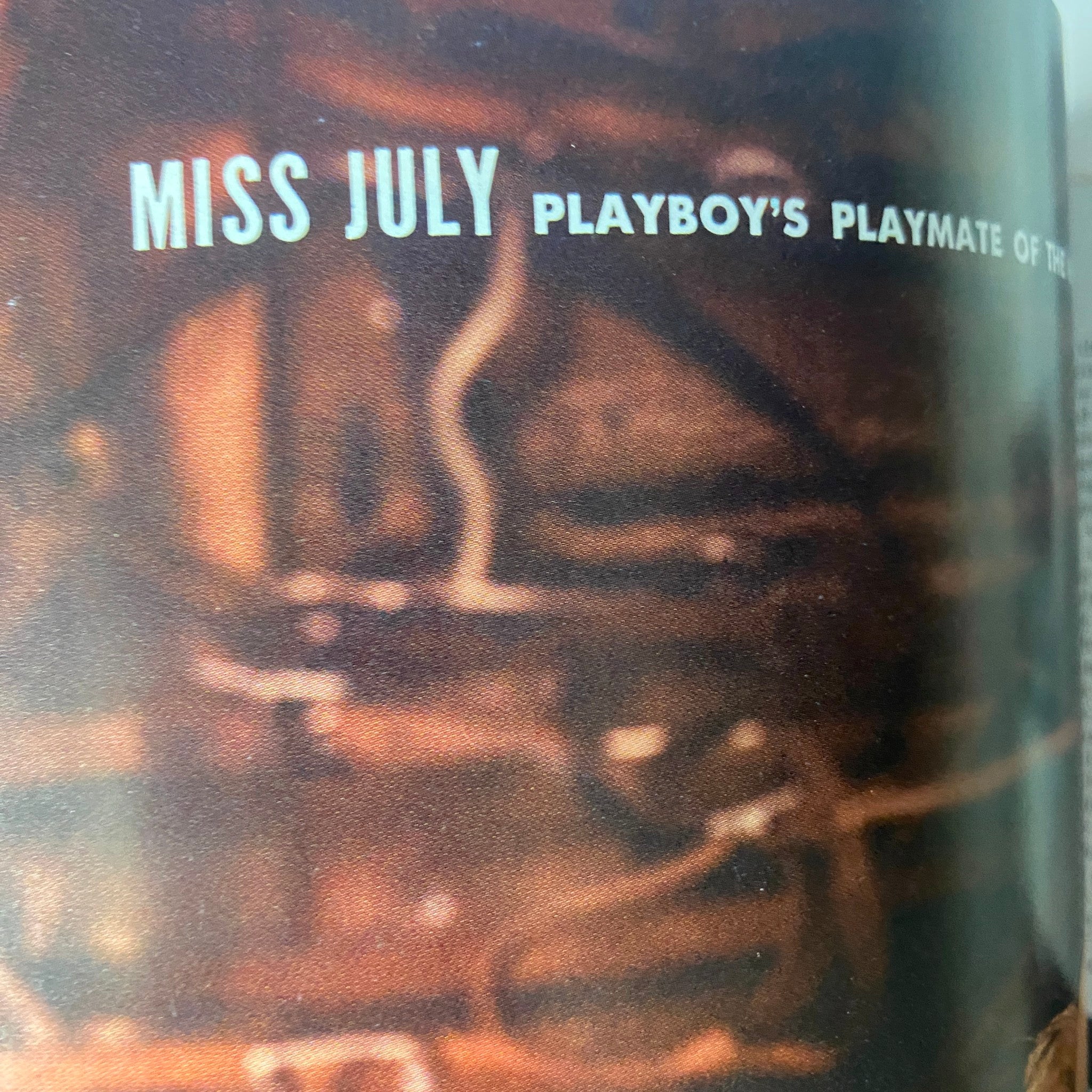 Text page highlighting Melba Ogle as Playboy's Playmate of the Month in July 1964 issue.