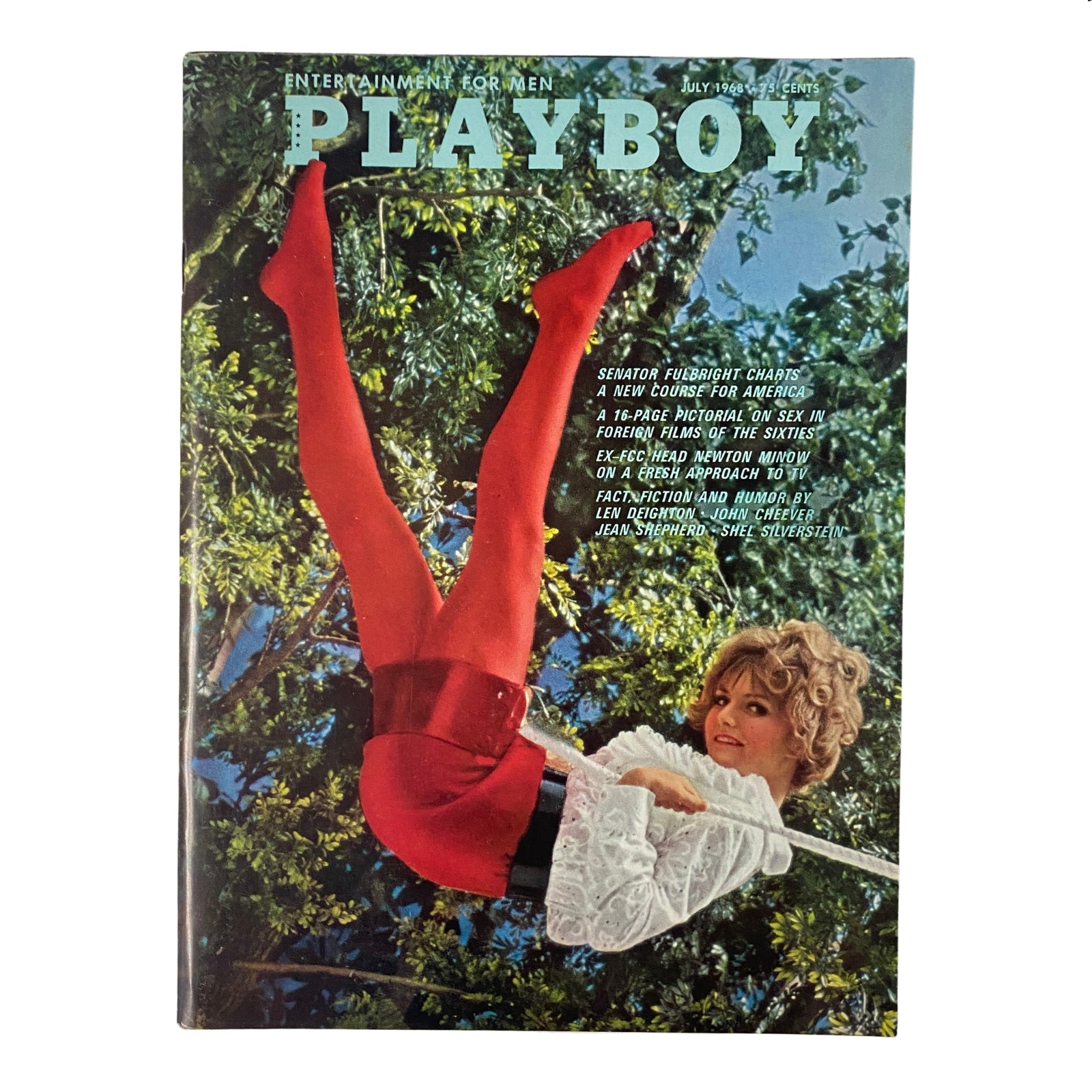 Playboy Magazine July 1968 issue featuring Playmate Melodye Prentiss on the cover, showcasing her vibrant red outfit in an outdoor setting.