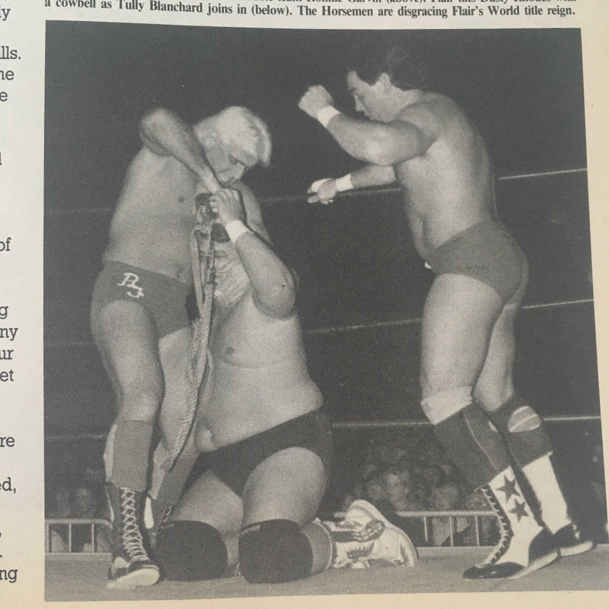 Pro Wrestling Illustrated October 1987 Ric Flair & Steve Williams, No Label VG - Image capturing a dramatic wrestling scene with two wrestlers, Ric Flair and another wrestler, double-teaming an opponent. This highlights the infamous tactics of The Horsemen during a title match.