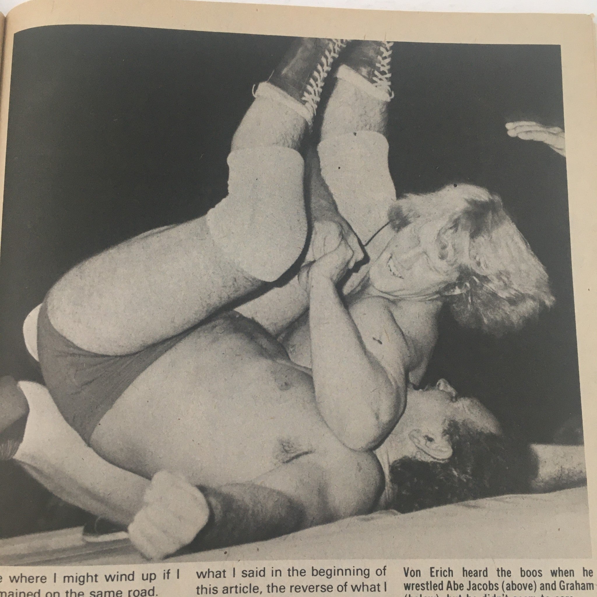Vintage wrestling photo in Sports Review Wrestling October 1982 showing a match between two grapplers, capturing the action and excitement of professional wrestling.