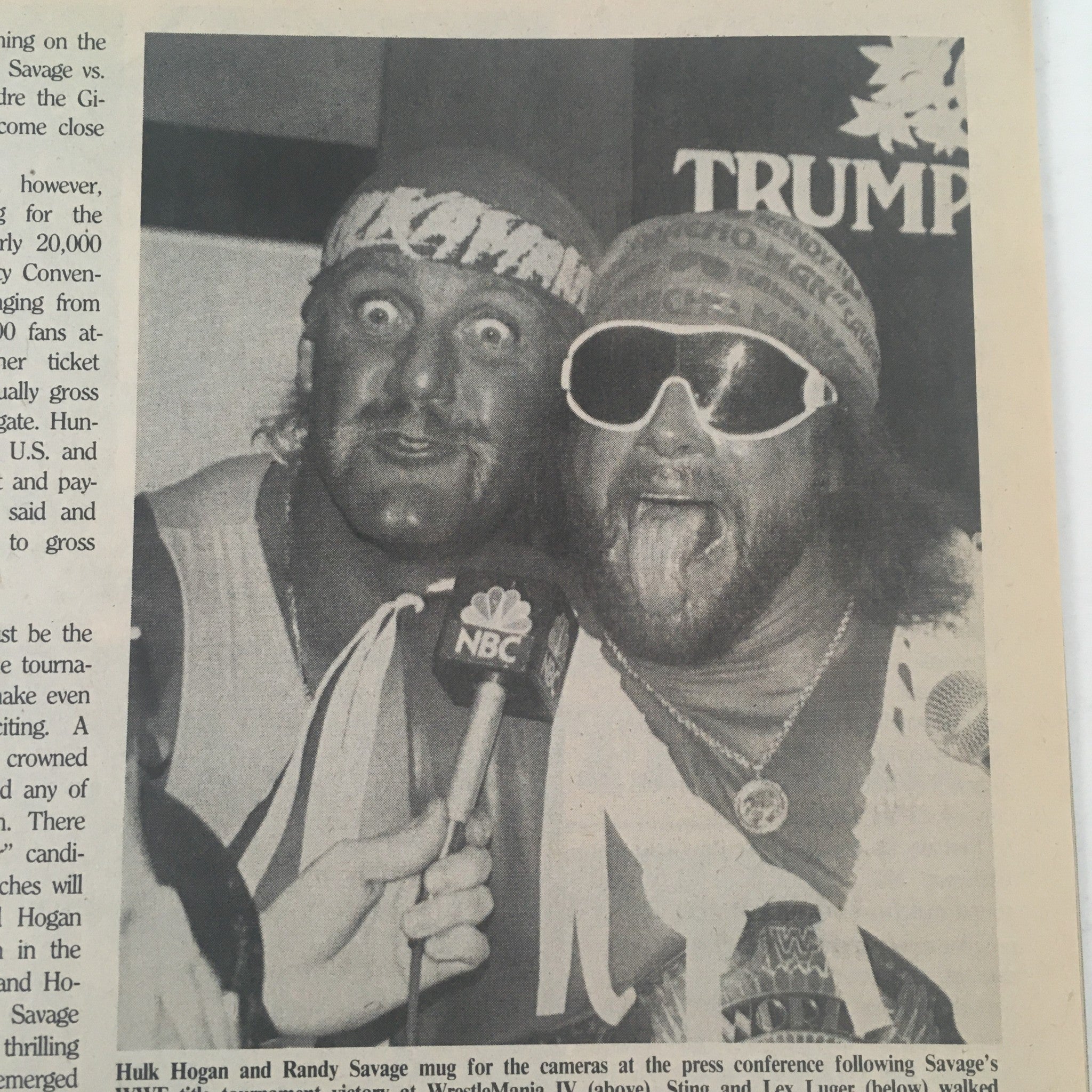 Hulk Hogan and Randy Savage at a press conference, as featured in Pro Wrestling Illustrated September 1988, discussing wrestling events.