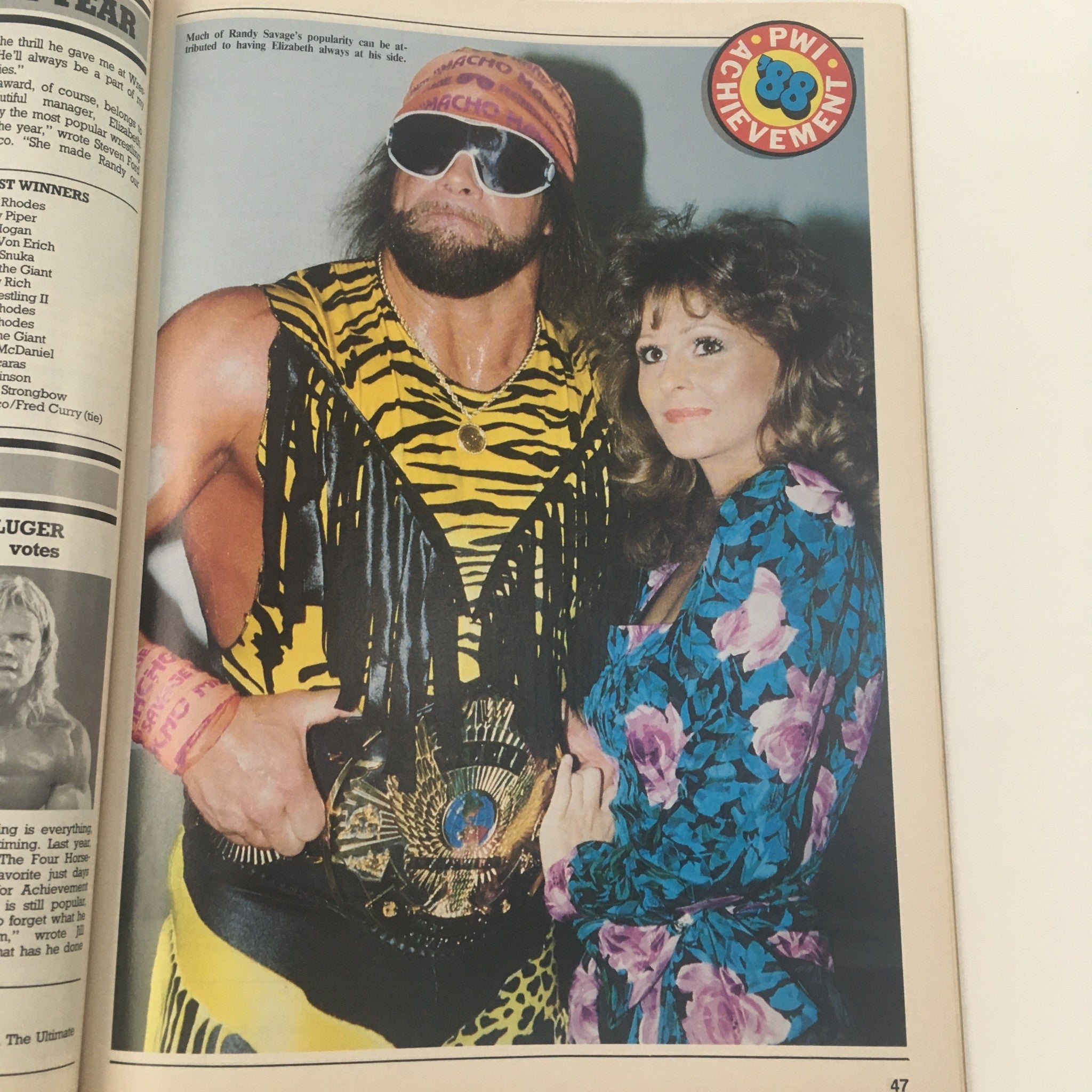 A vintage image from Pro Wrestling Illustrated March 1989 featuring professional wrestlers, Hulk Hogan and Kerry Von Erich, showcasing their iconic styles. The image captures a moment with Randy Savage and Elizabeth, illustrating the vibrant personalities of wrestling at that time, reflecting the magazine's theme of wrestling achievements.